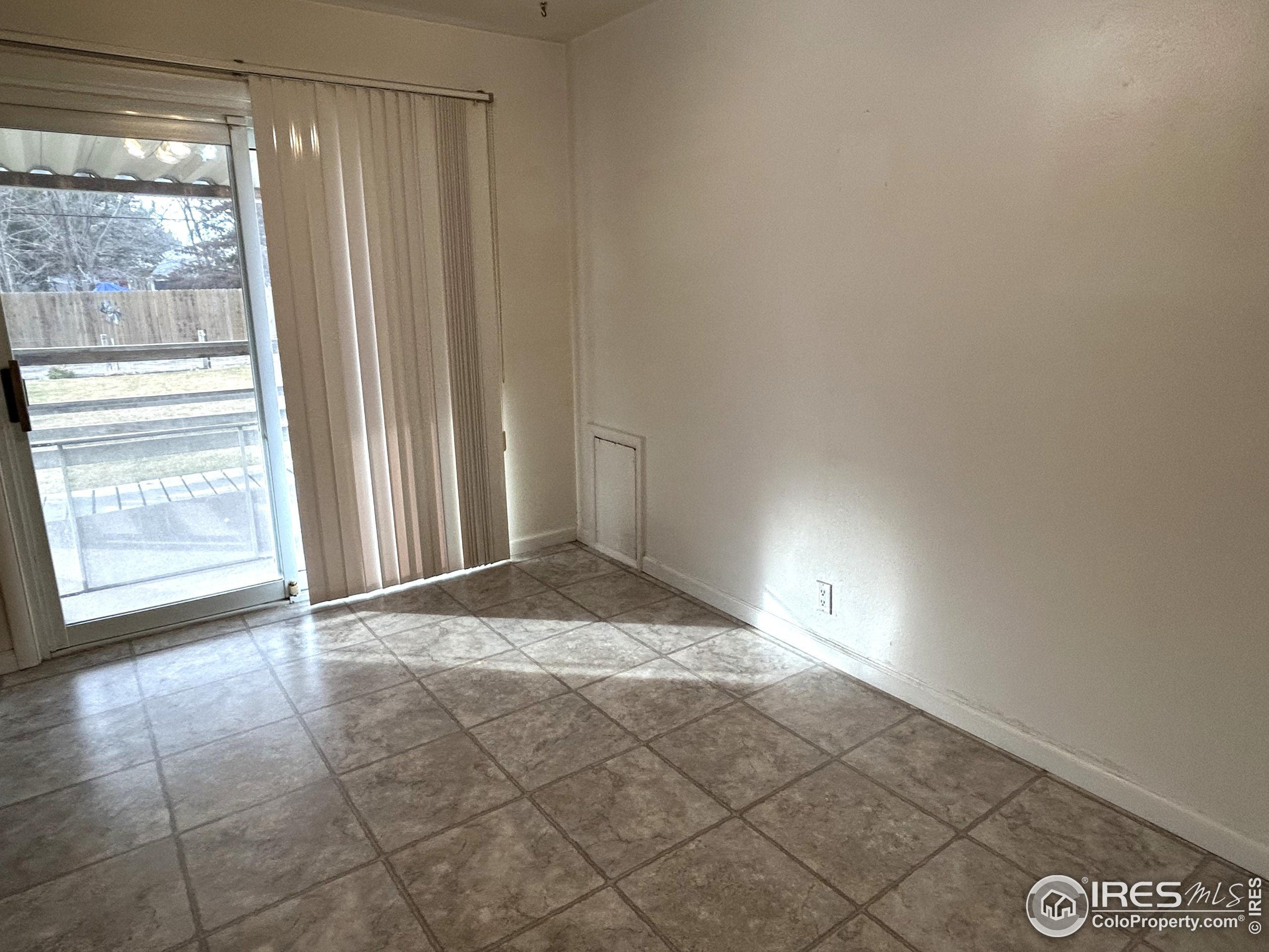 123 Balsam Street Fort Morgan, CO 80701 - Photo 18 of 34 a view of empty room with window