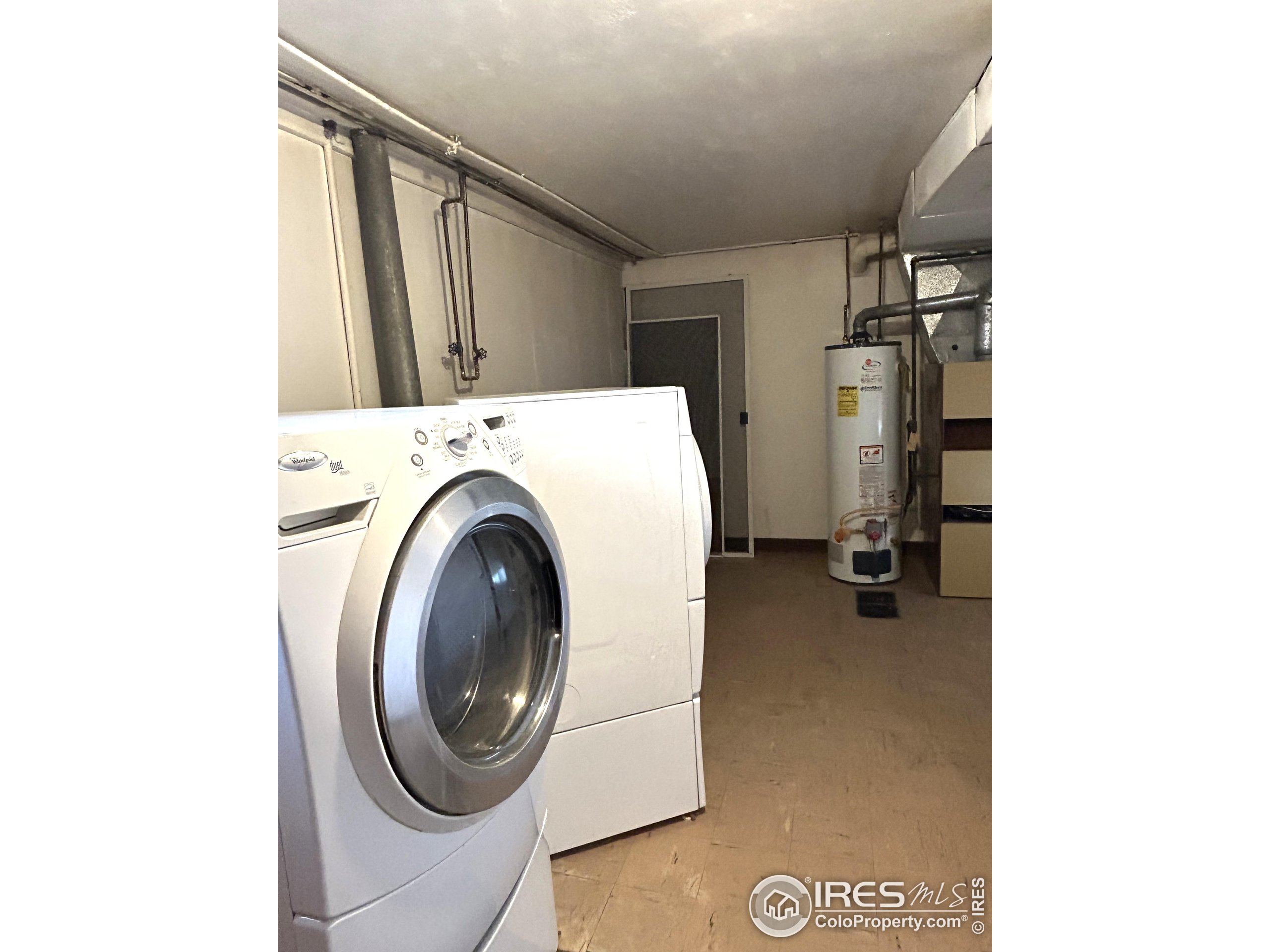 123 Balsam Street Fort Morgan, CO 80701 - Photo 20 of 34 a utility room with dryer and washer