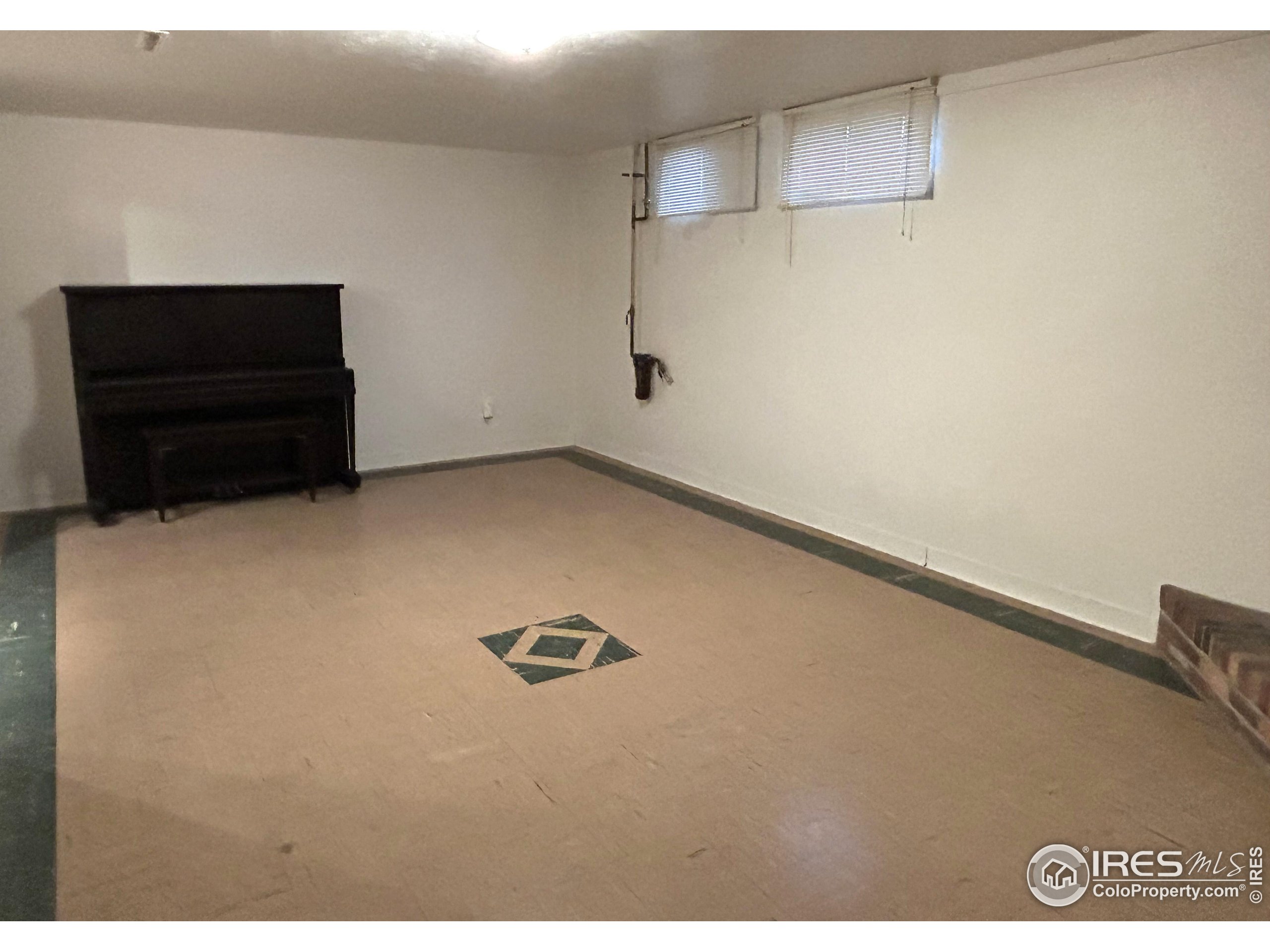 123 Balsam Street Fort Morgan, CO 80701 - Photo 22 of 34 a view of a livingroom with an empty space