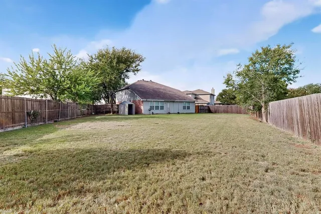 a house view with a garden space