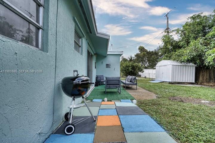 6443 Perry Street Hollywood, FL 33024 - Photo 12 of 24 a view of a backyard