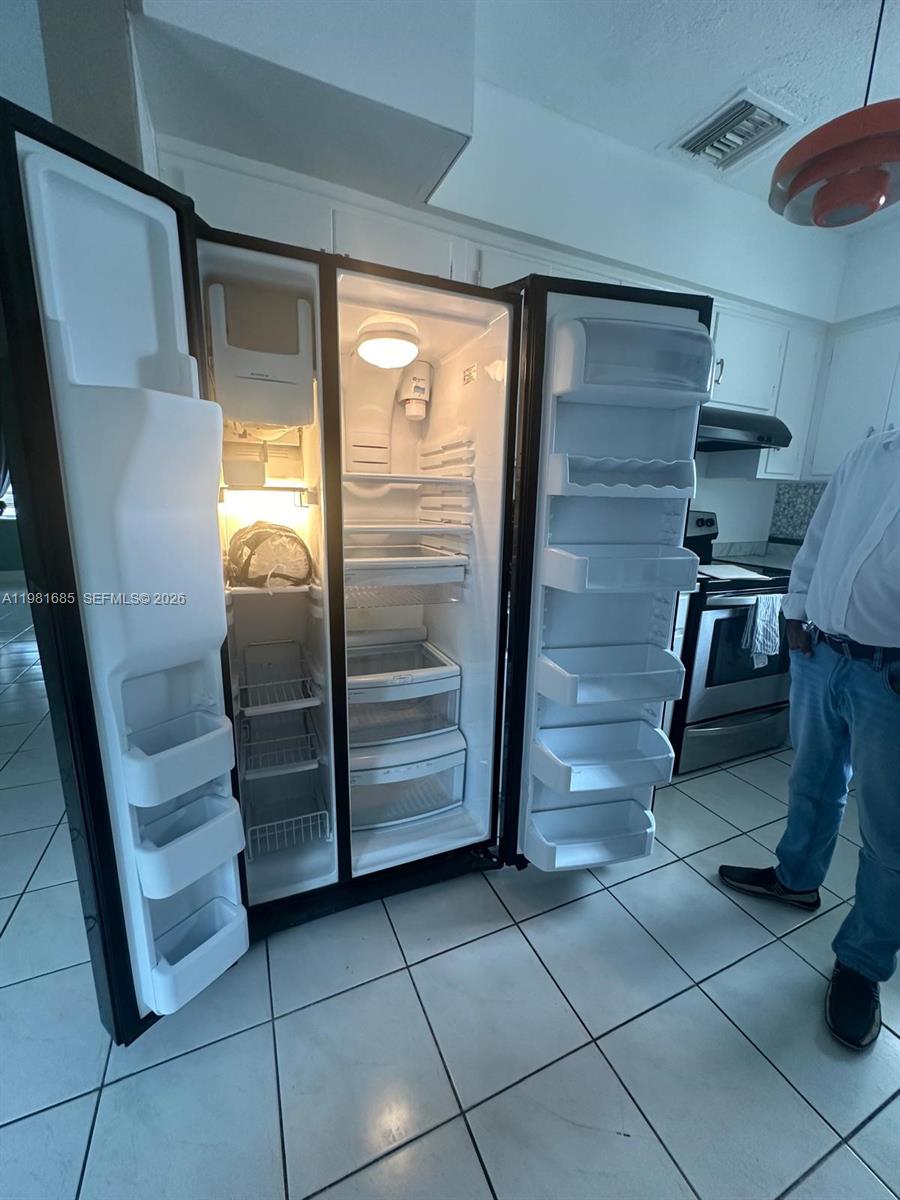 6443 Perry Street Hollywood, FL 33024 - Photo 17 of 24 a view of entryway