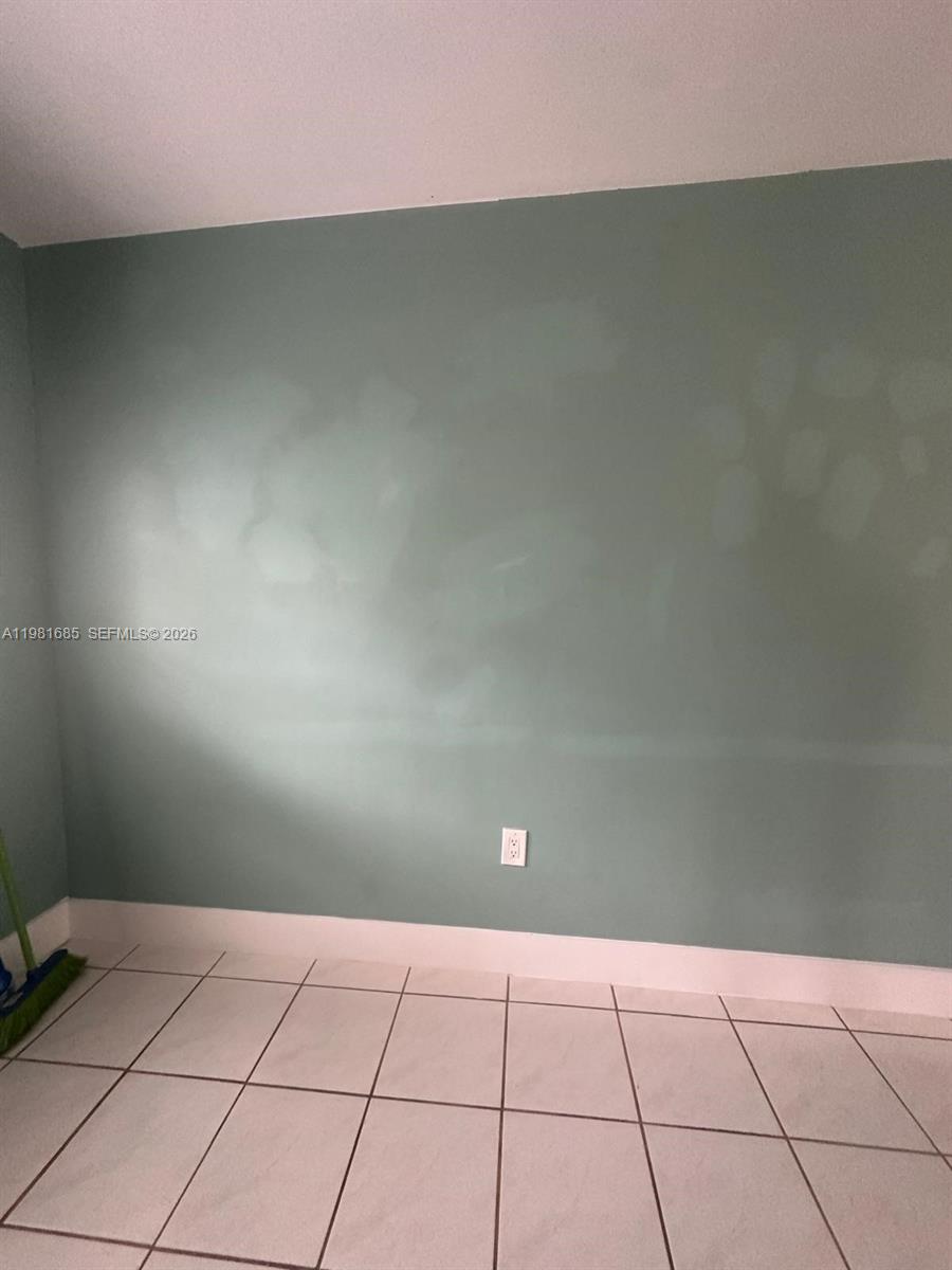 6443 Perry Street Hollywood, FL 33024 - Photo 19 of 24 a view of an empty room