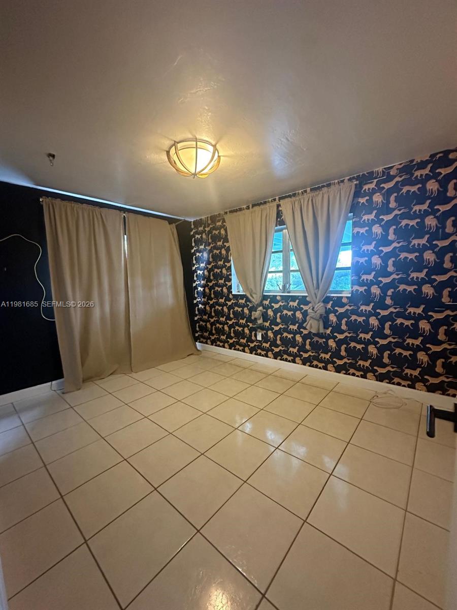 6443 Perry Street Hollywood, FL 33024 - Photo 22 of 24 a view of a garage