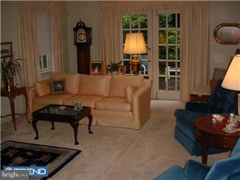 761 Bair Road Berwyn, PA 19312 - Photo 4 of 12 a living room with furniture and a lamp