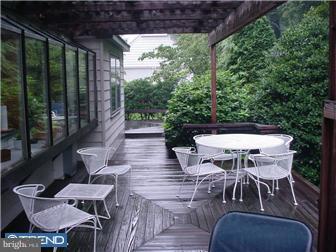 761 Bair Road Berwyn, PA 19312 - Photo 6 of 12 a patio with glass top table and chairs