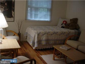 761 Bair Road Berwyn, PA 19312 - Photo 8 of 12 a bedroom with a bed a desk and chair