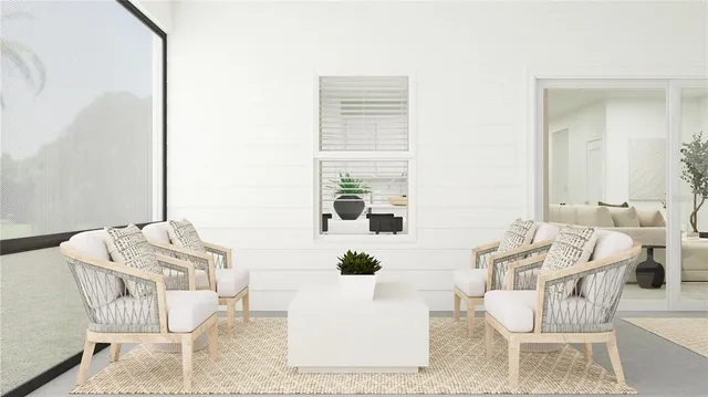 a living room with furniture and a table