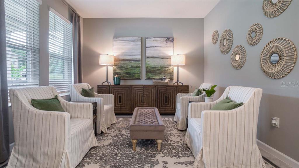 5625 Nina Way St. Cloud, FL 34771 - Photo 5 of 18 a living room with furniture and a large window