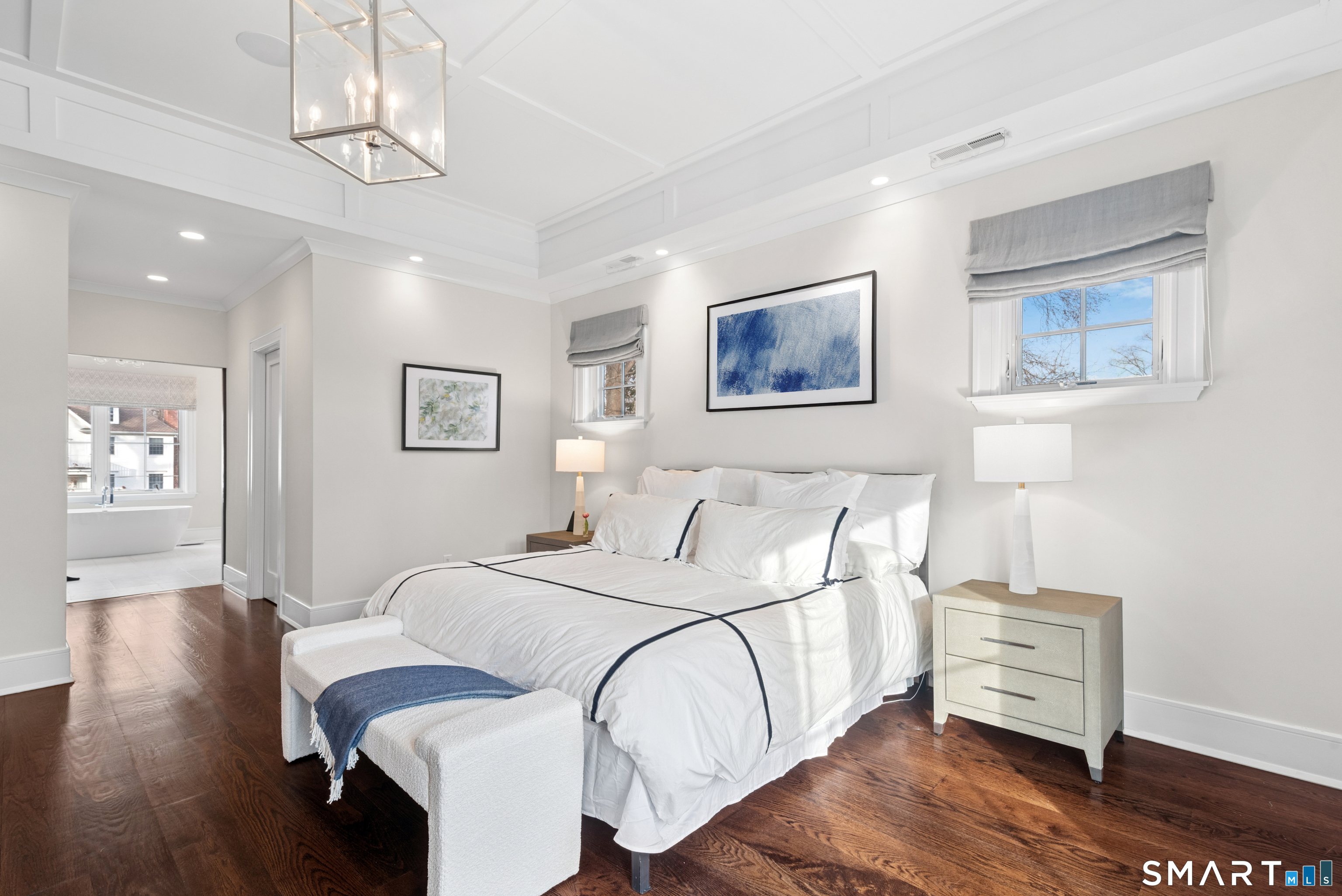 42 Hillcrest Road New Canaan, CT 06840 - Photo 18 of 38 a bedroom with a bed and wooden floor