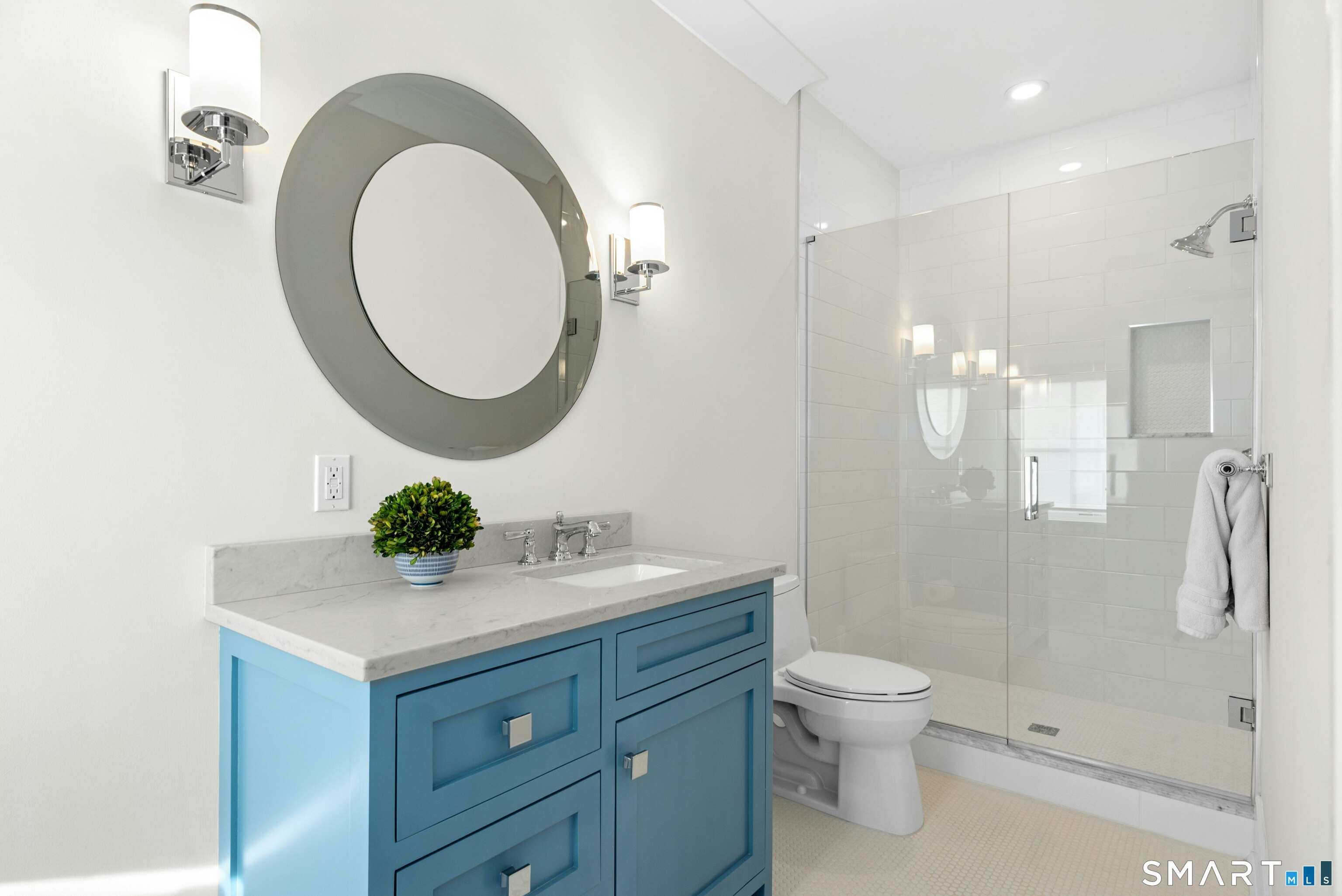 42 Hillcrest Road New Canaan, CT 06840 - Photo 25 of 38 a bathroom with a sink a toilet and shower