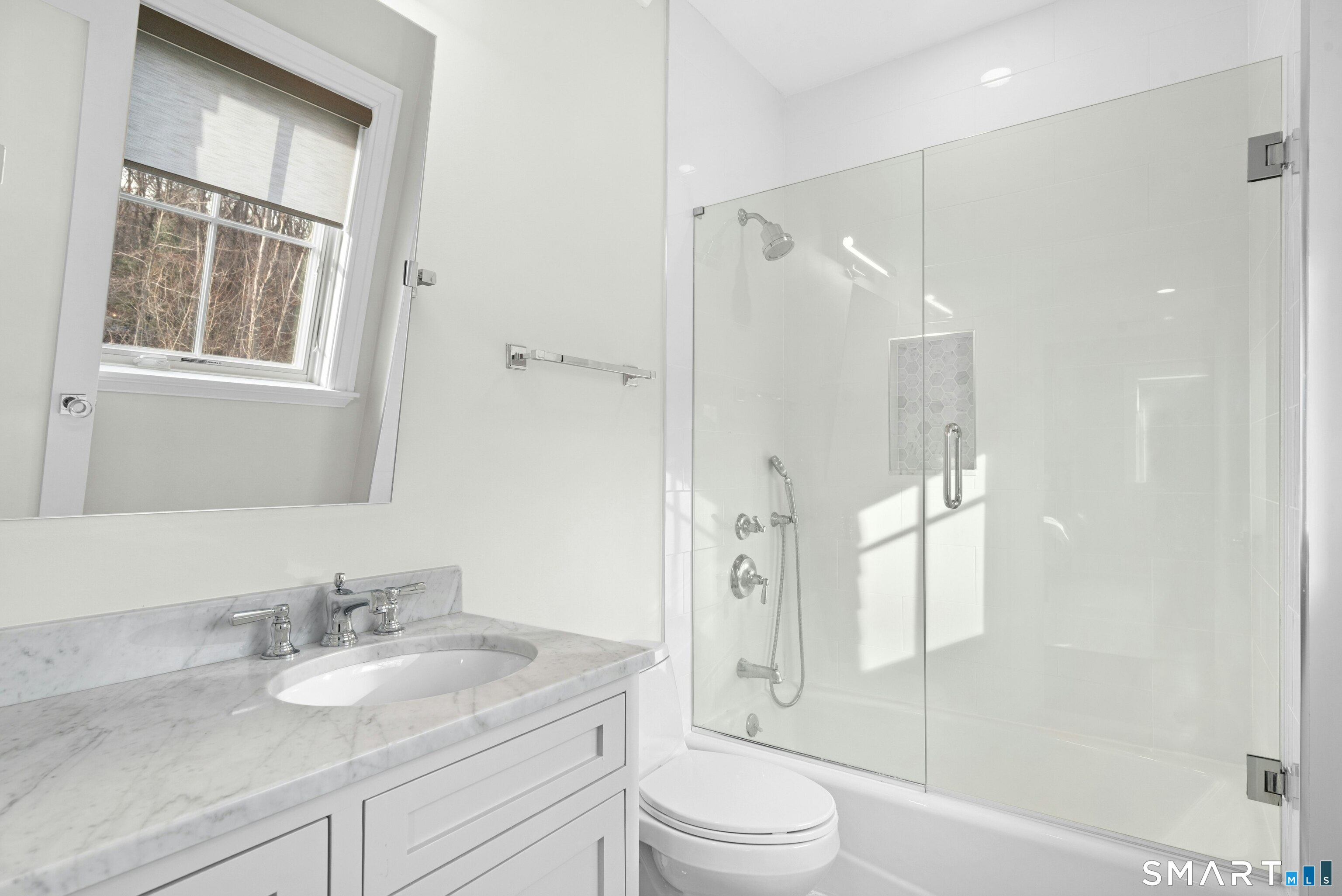 42 Hillcrest Road New Canaan, CT 06840 - Photo 27 of 38 a bathroom with a granite countertop sink a toilet and shower