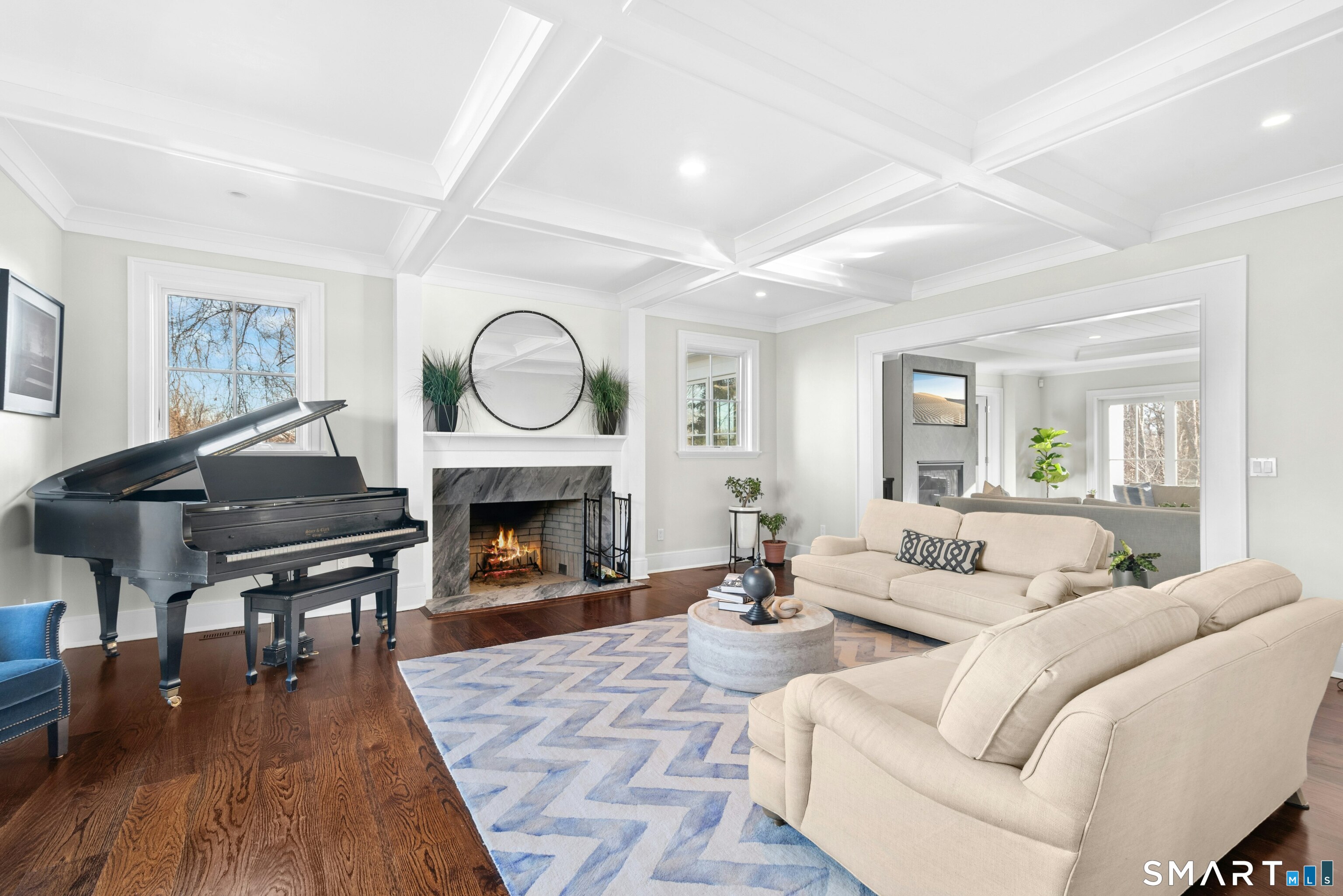 42 Hillcrest Road New Canaan, CT 06840 - Photo 7 of 38 a living room with furniture and a fireplace