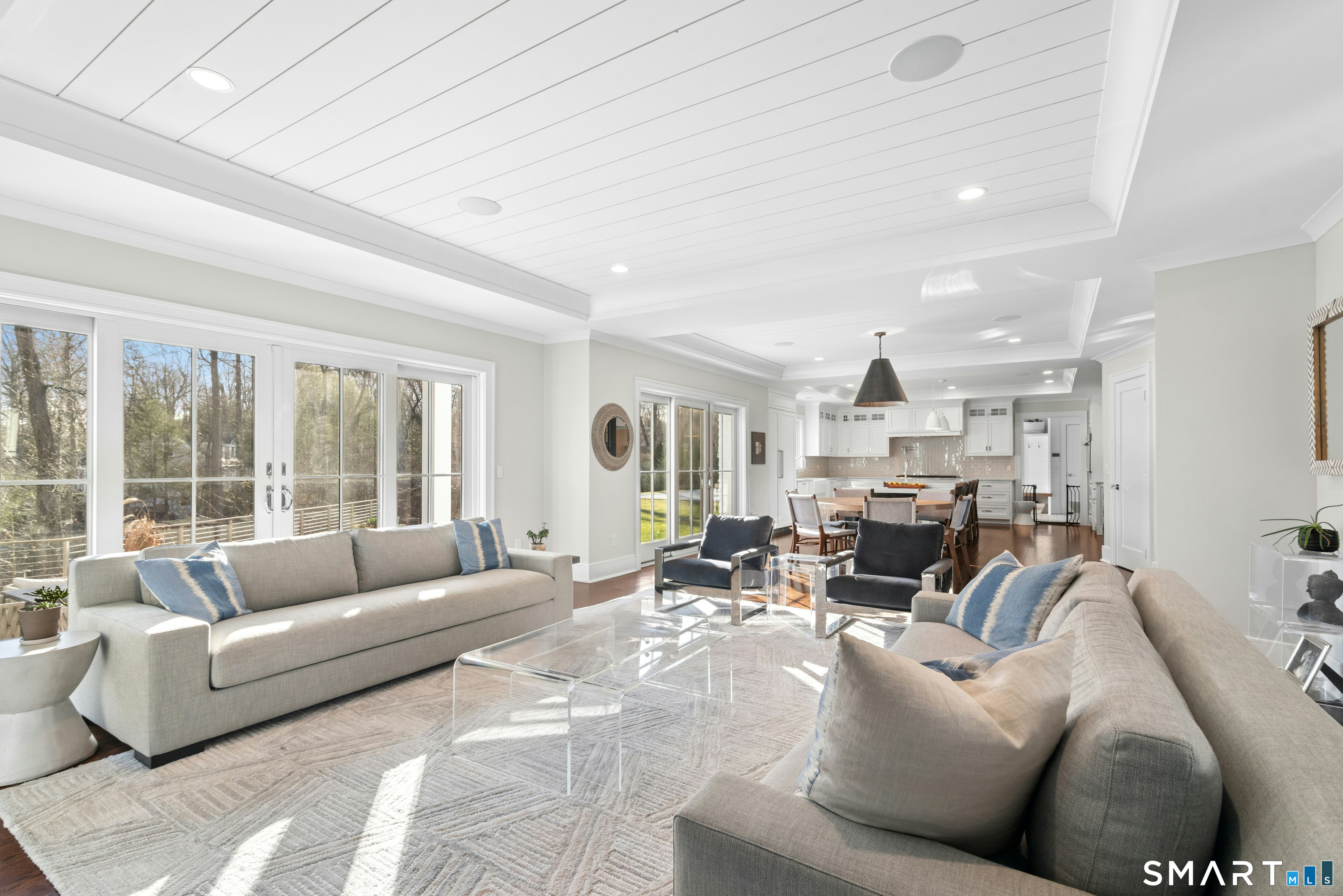 42 Hillcrest Road New Canaan, CT 06840 - Photo 9 of 38 a living room with furniture and a large window