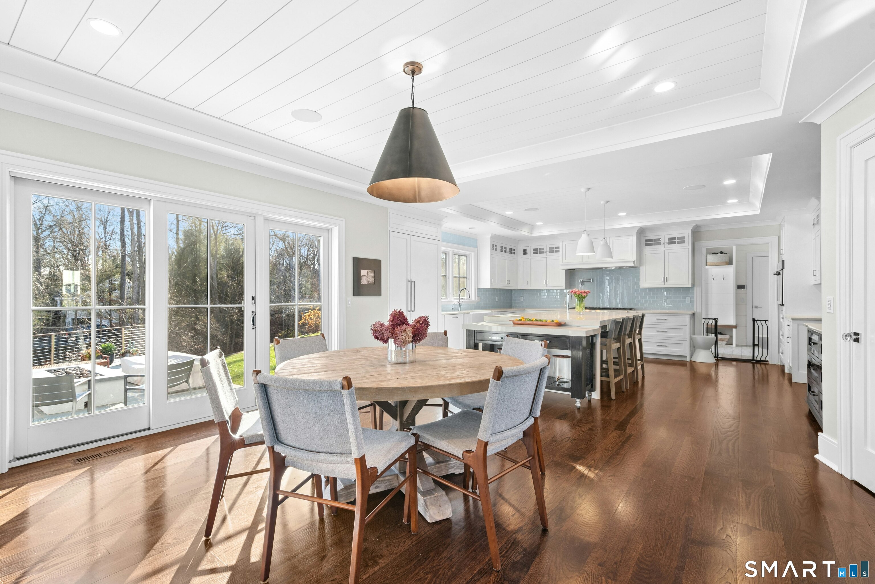 42 Hillcrest Road New Canaan, CT 06840 - Photo 10 of 38 a view of a dining room with furniture window and wooden floor