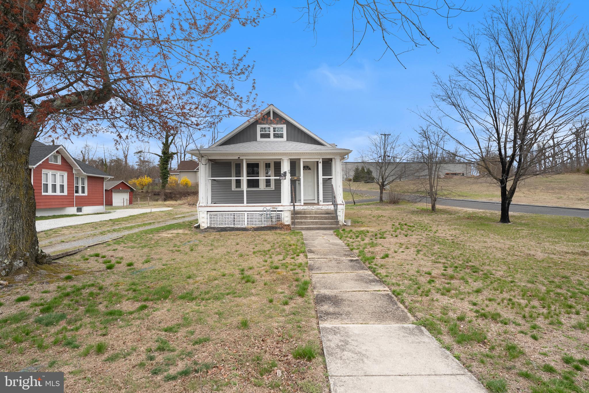 1401 Glassboro Road Wenonah, NJ 08090 - Photo 2 of 41 a front view of a house with a yard