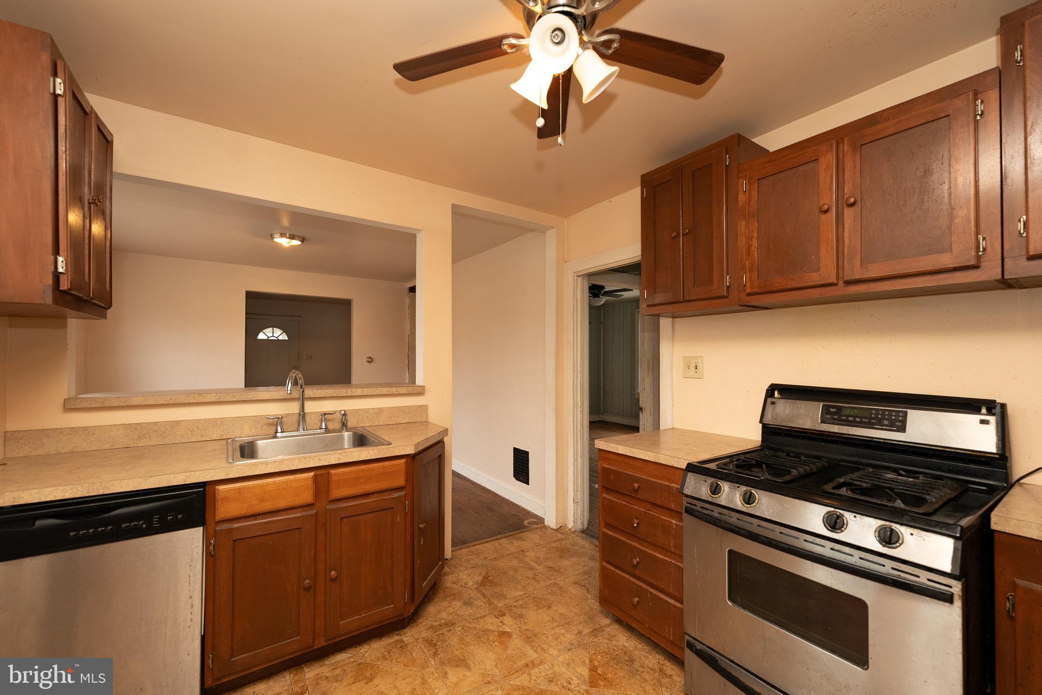 1401 Glassboro Road Wenonah, NJ 08090 - Photo 23 of 41 a kitchen with a stove and a microwave