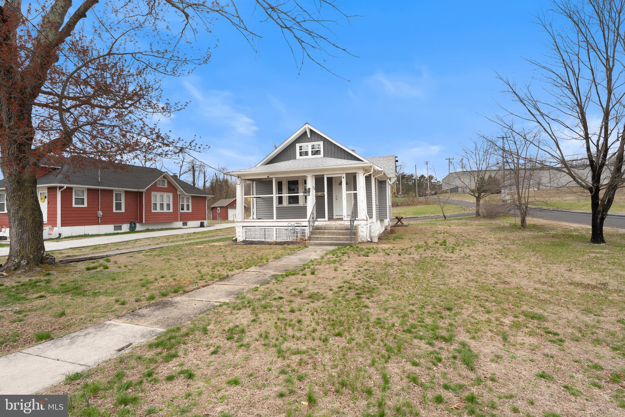 1401 Glassboro Road Wenonah, NJ 08090 - Photo 3 of 41 a front view of a house with a yard