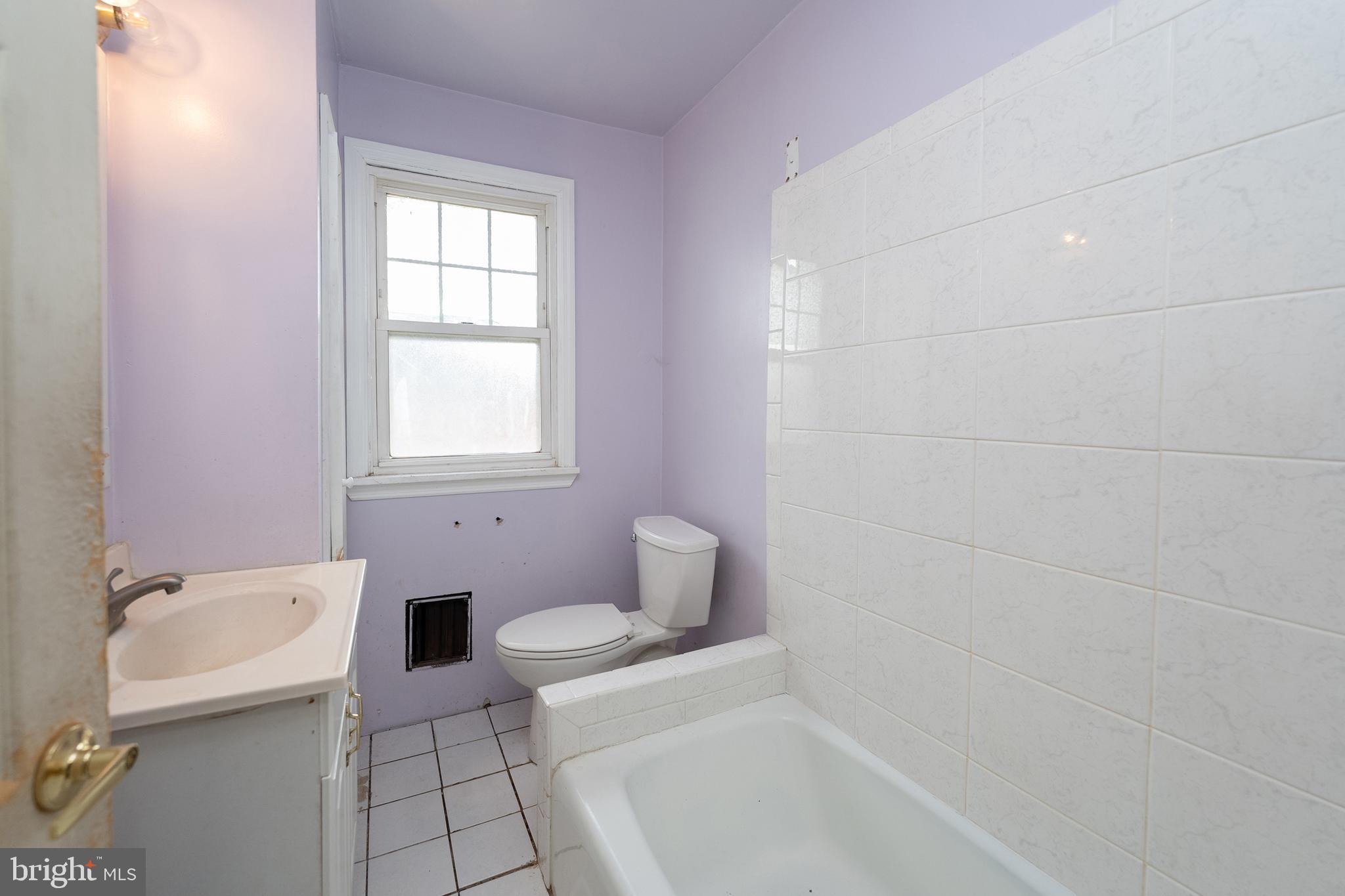 1401 Glassboro Road Wenonah, NJ 08090 - Photo 36 of 41 a bathroom with a tub toilet and sink