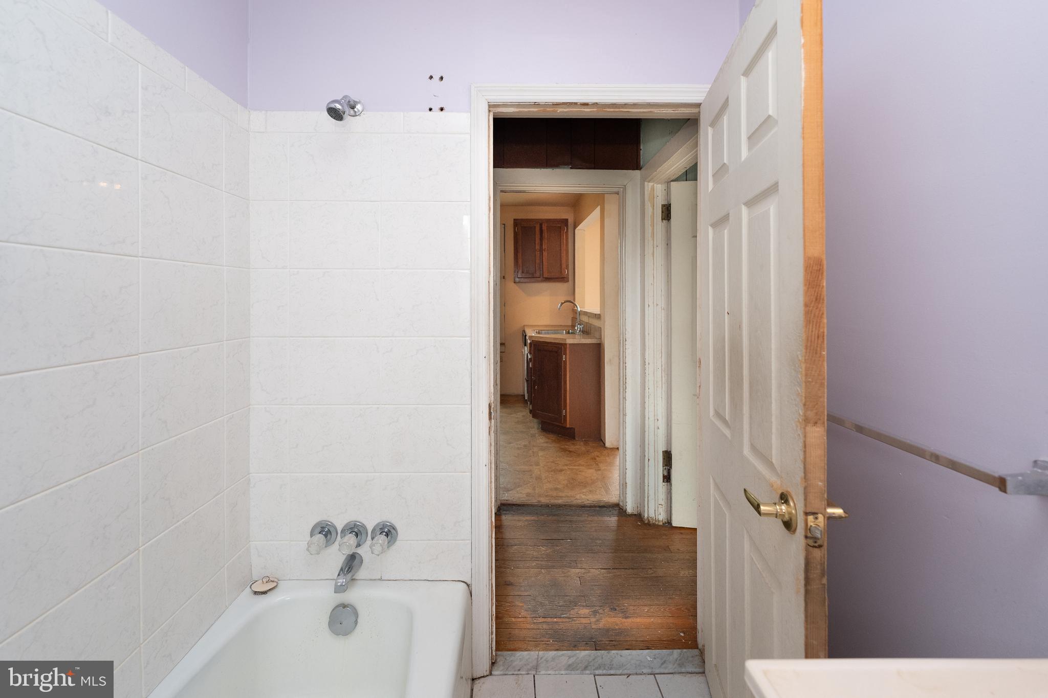 1401 Glassboro Road Wenonah, NJ 08090 - Photo 38 of 41 a bathroom with a tub and shower