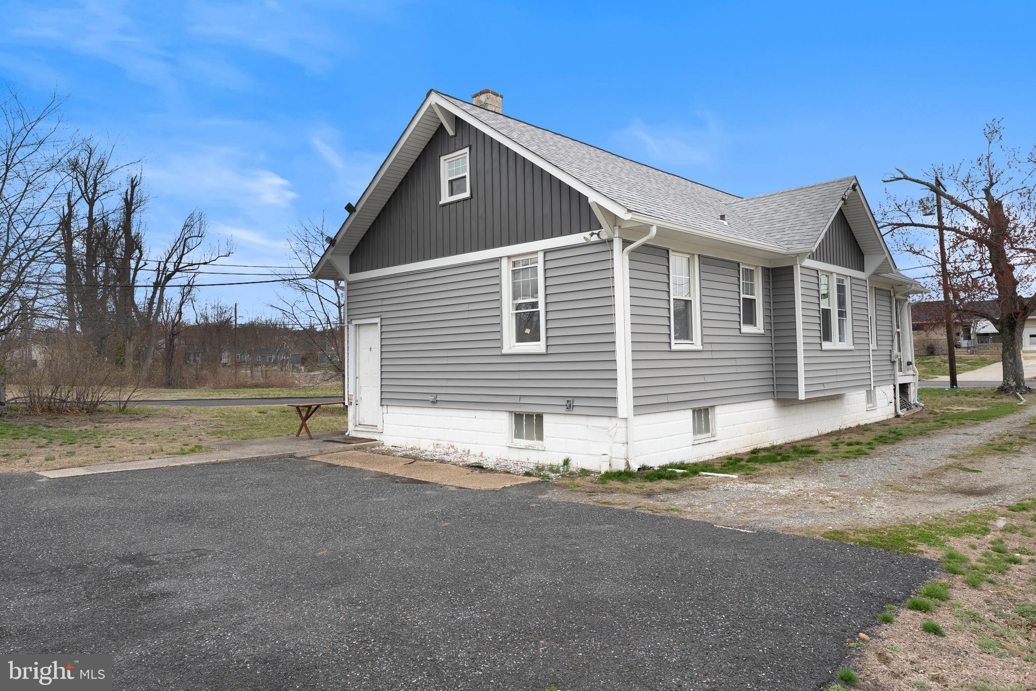 1401 Glassboro Road Wenonah, NJ 08090 - Photo 8 of 41 a front view of a house with a yard