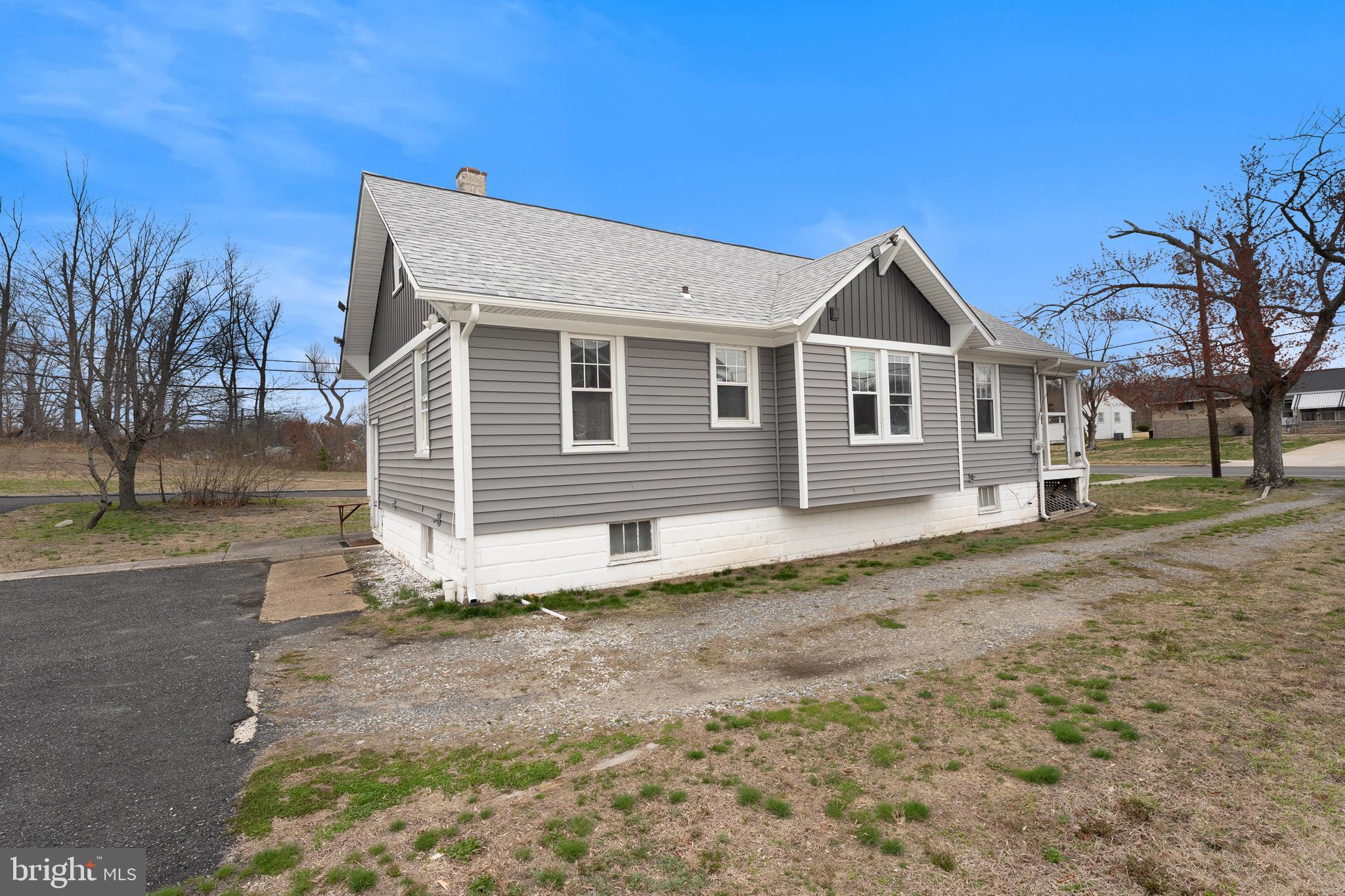 1401 Glassboro Road Wenonah, NJ 08090 - Photo 9 of 41 a front view of a house with a yard