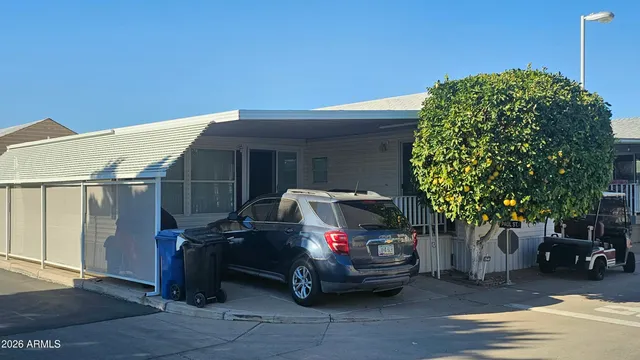a car parked in front of a house