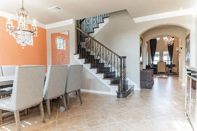 a view of a hallway with seating area