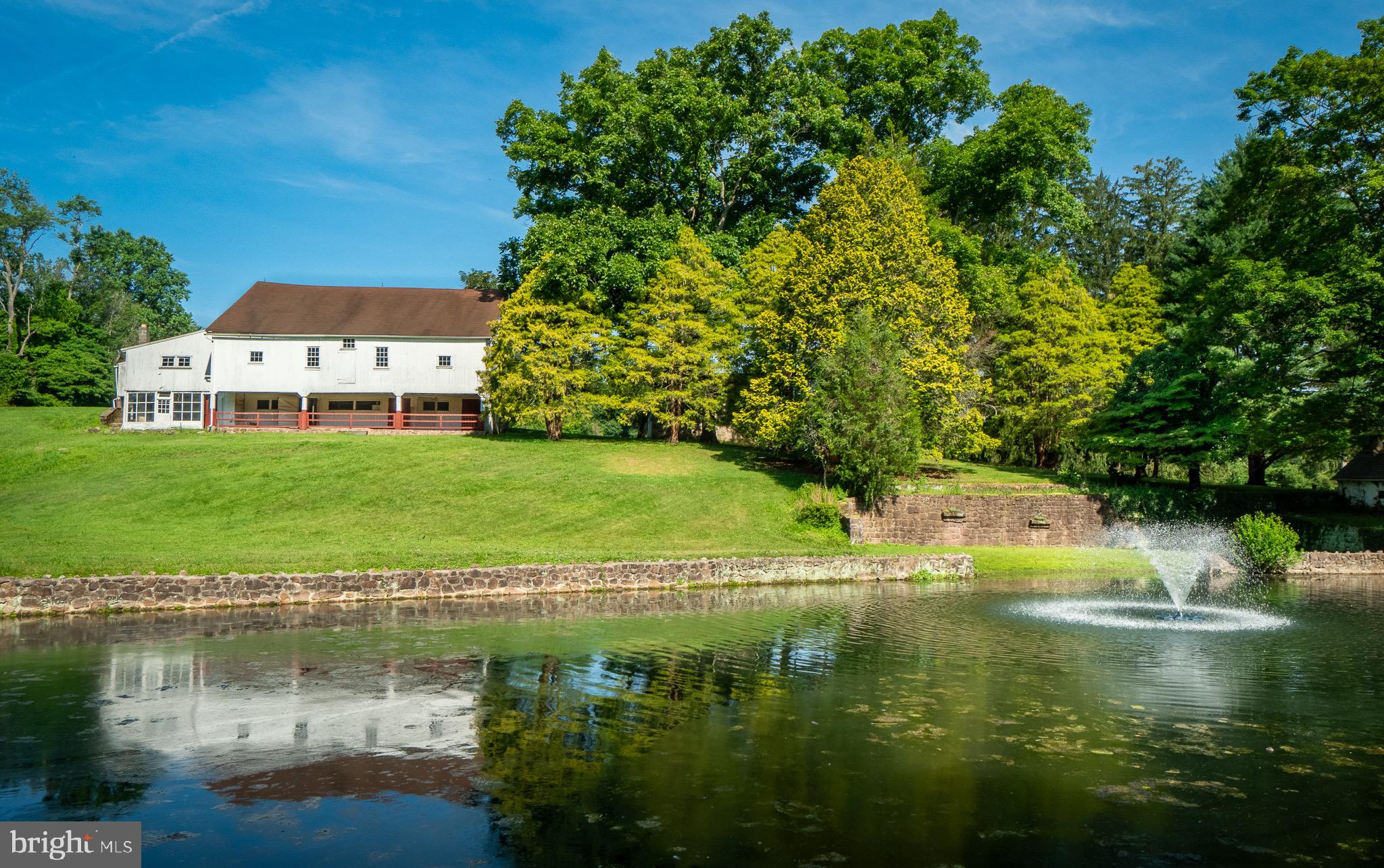 a view of a lake with a building in the background