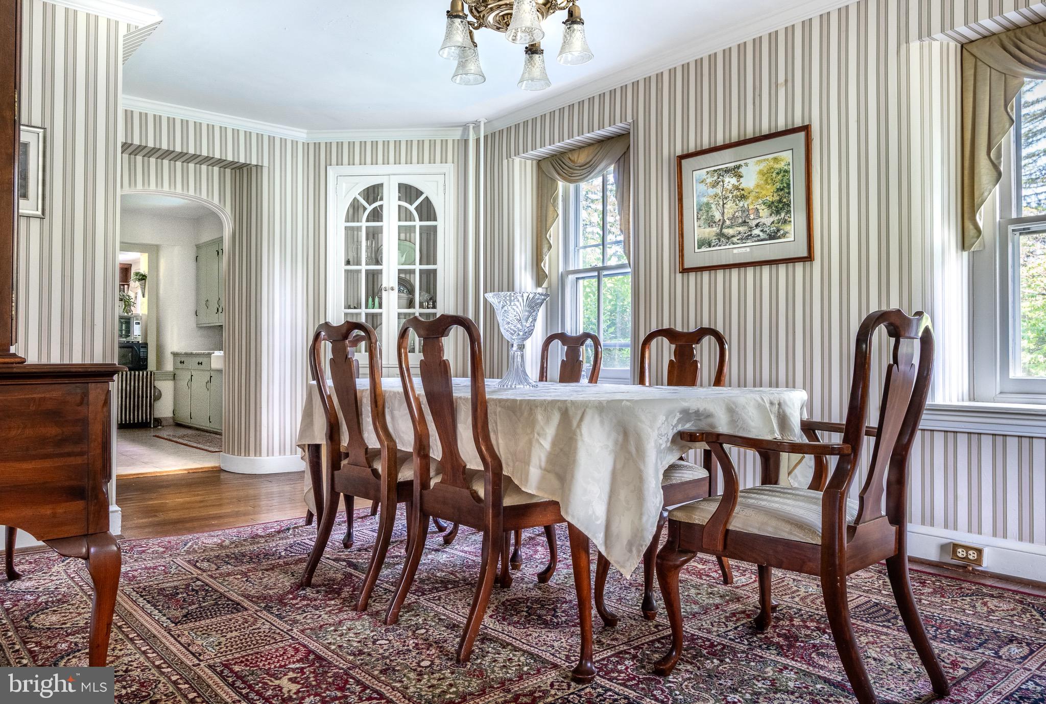 1453 Coldsprings Road Pottstown, PA 19465 - Photo 11 of 53 a view of a dining room with furniture window and wooden floor