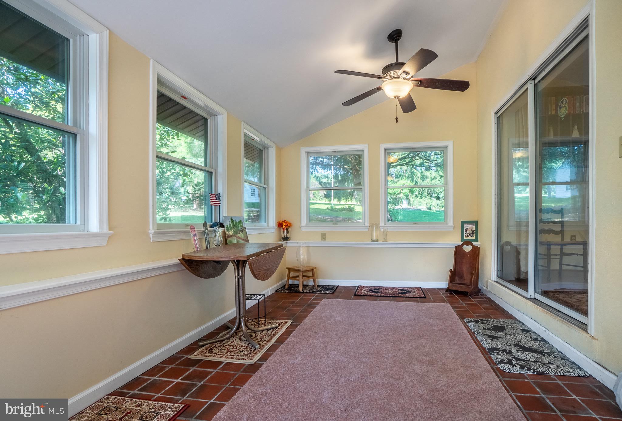 1453 Coldsprings Road Pottstown, PA 19465 - Photo 17 of 53 a living room with furniture and a large window