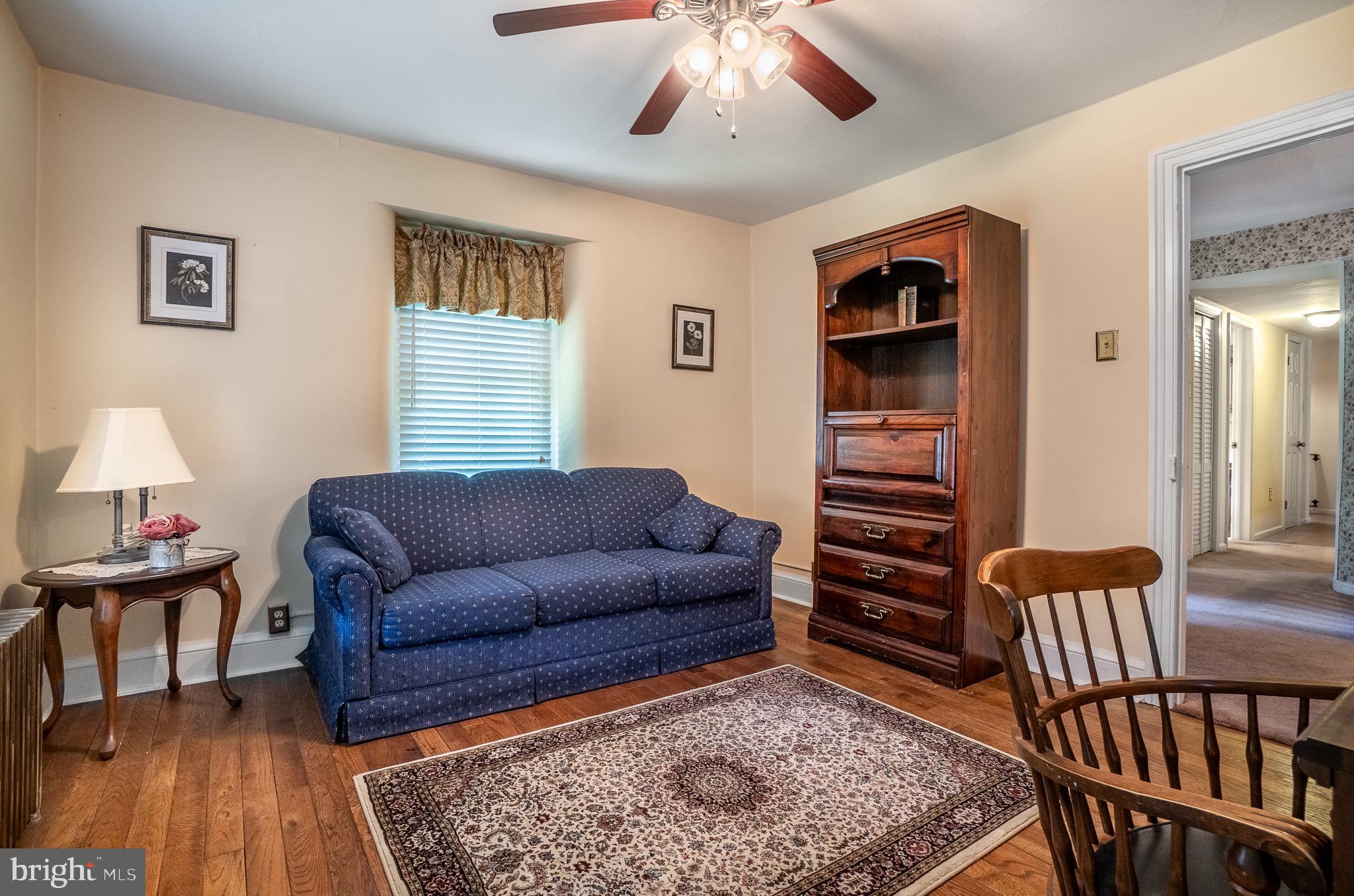 1453 Coldsprings Road Pottstown, PA 19465 - Photo 24 of 53 a living room with furniture and a rug
