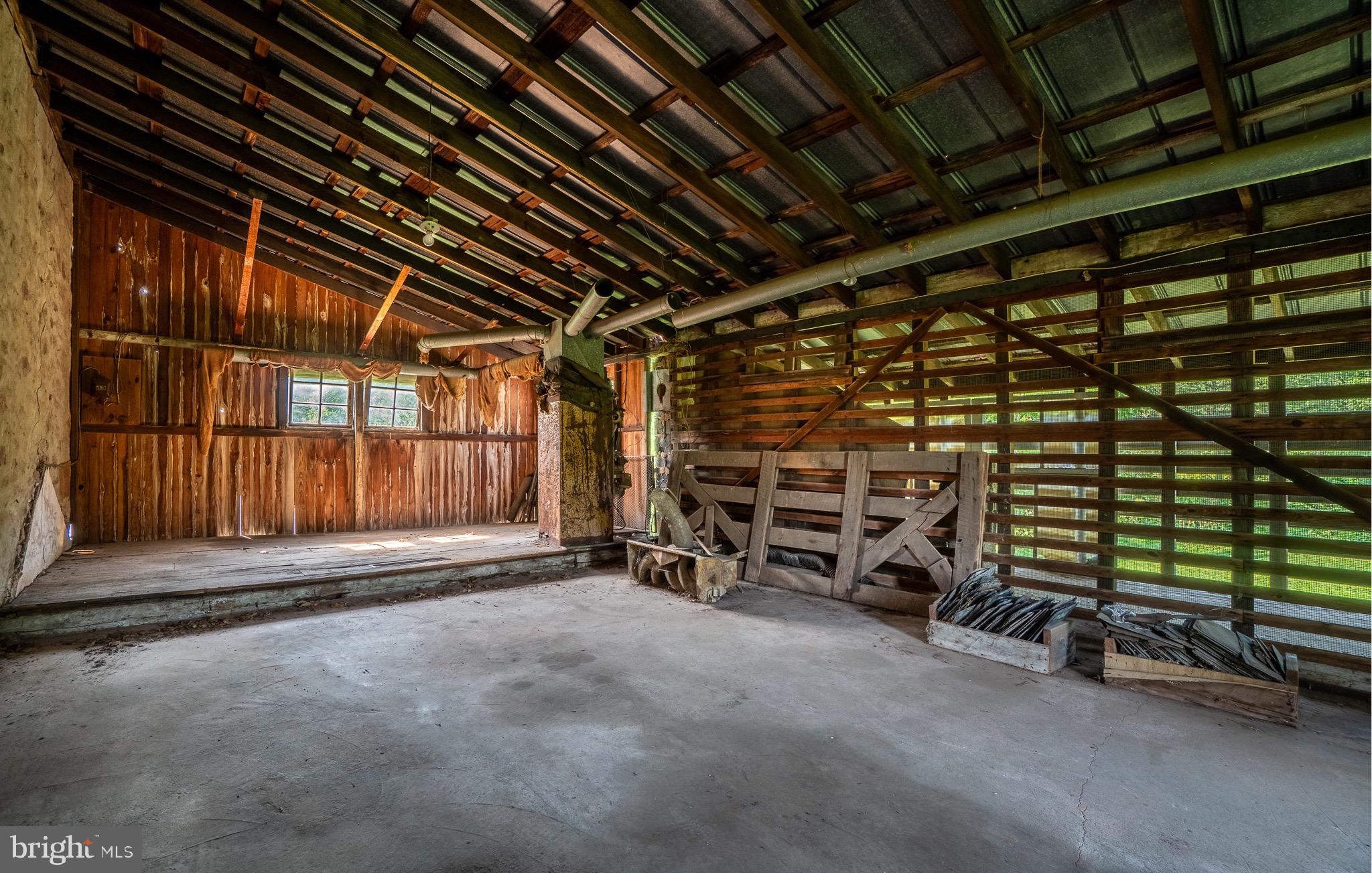 1453 Coldsprings Road Pottstown, PA 19465 - Photo 35 of 53 a view of an empty room with wooden walls