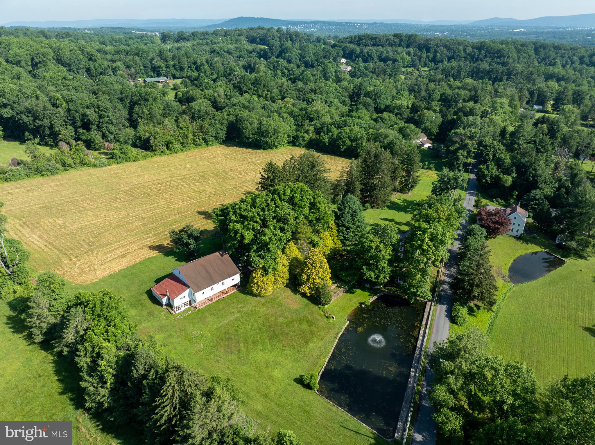 1453 Coldsprings Road Pottstown, PA 19465 - Photo 4 of 53 an aerial view of a golf course with parking space