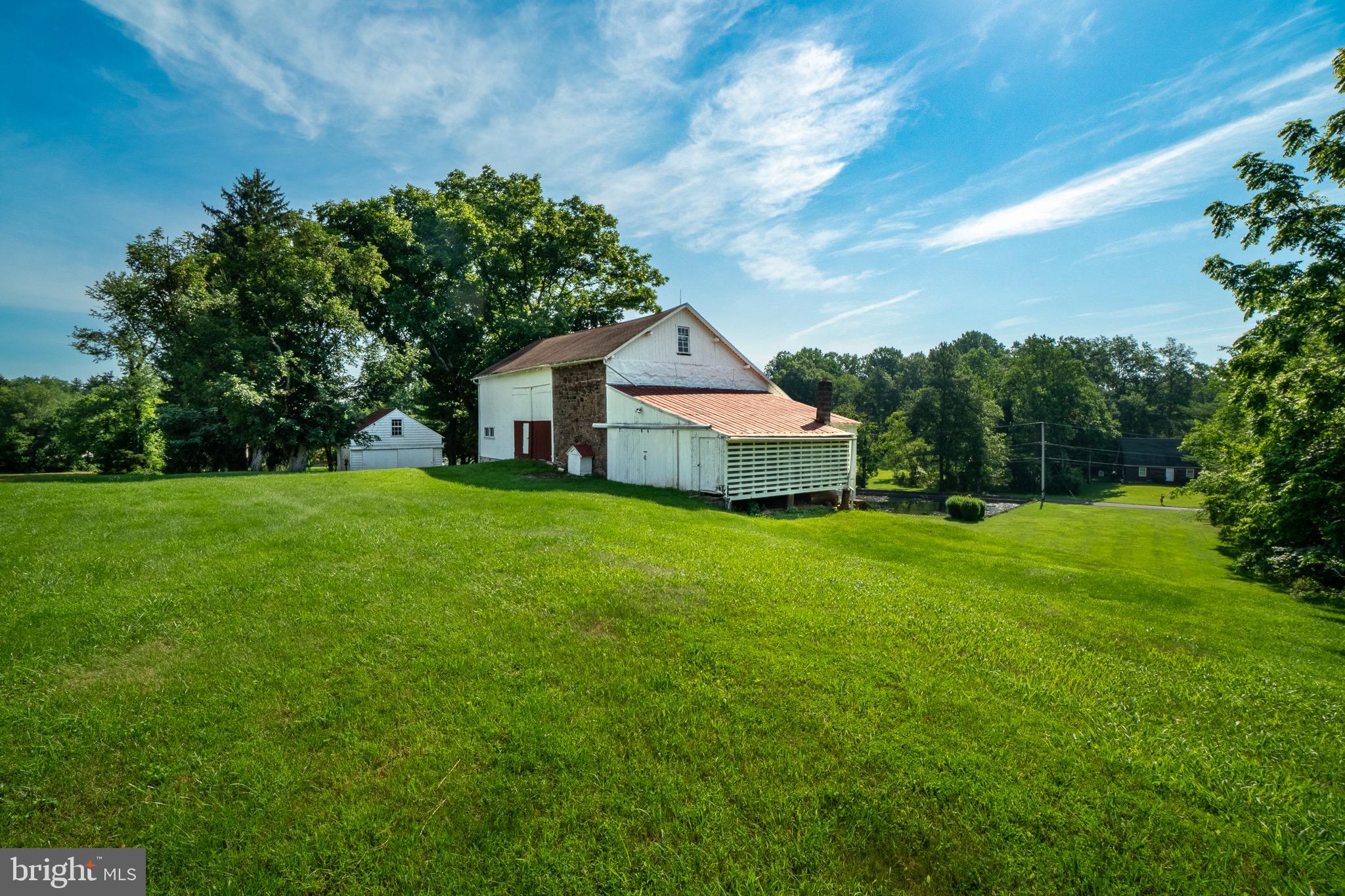 1453 Coldsprings Road Pottstown, PA 19465 - Photo 50 of 53 a front view of a house with garden