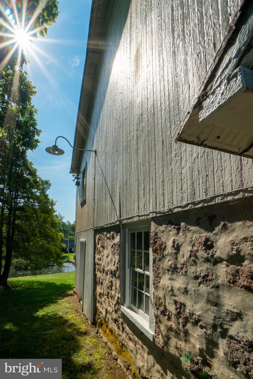 1453 Coldsprings Road Pottstown, PA 19465 - Photo 52 of 53 a view of a house with a yard