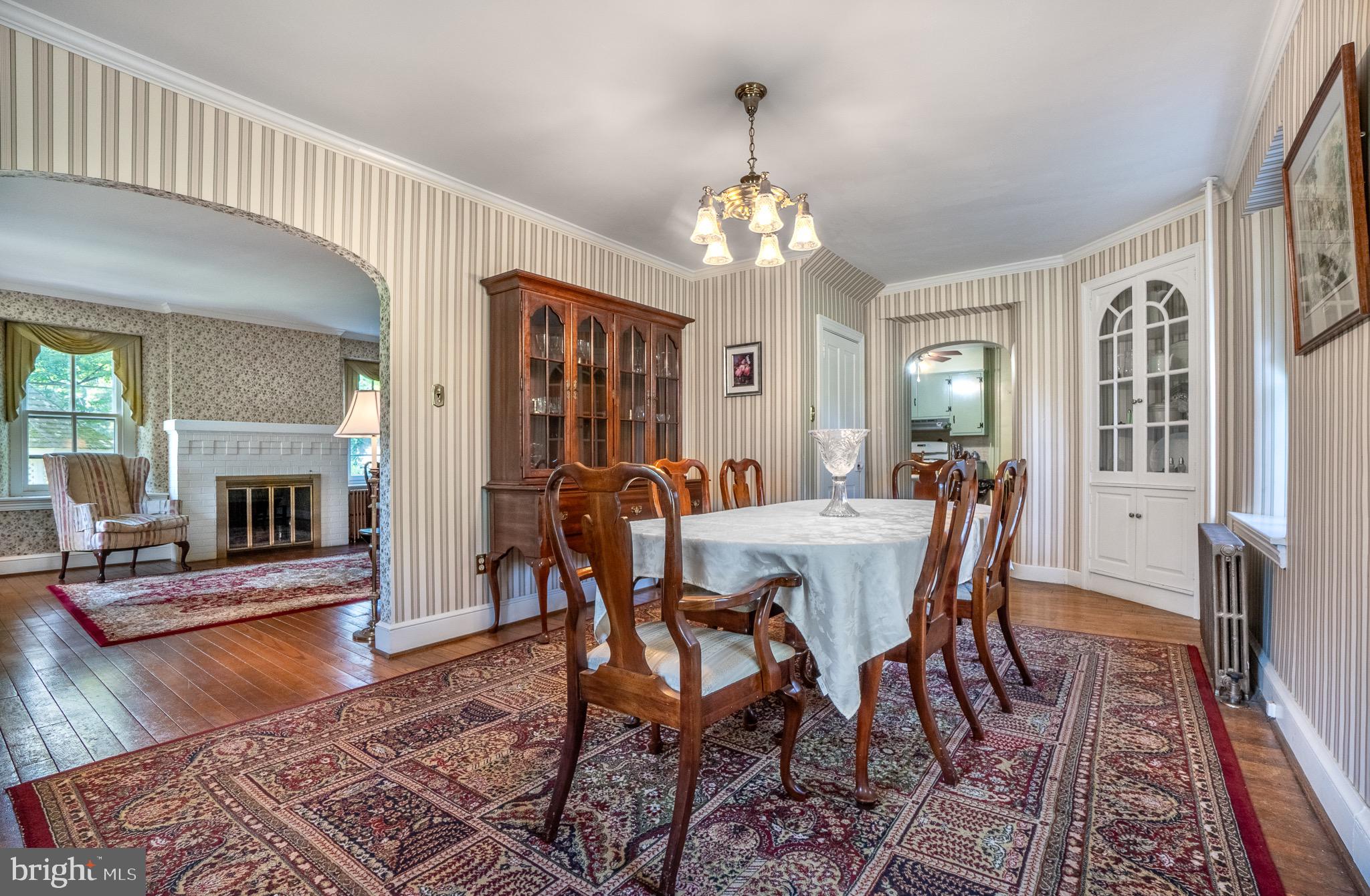 1453 Coldsprings Road Pottstown, PA 19465 - Photo 10 of 53 a view of a dining room with furniture a rug and wooden floor