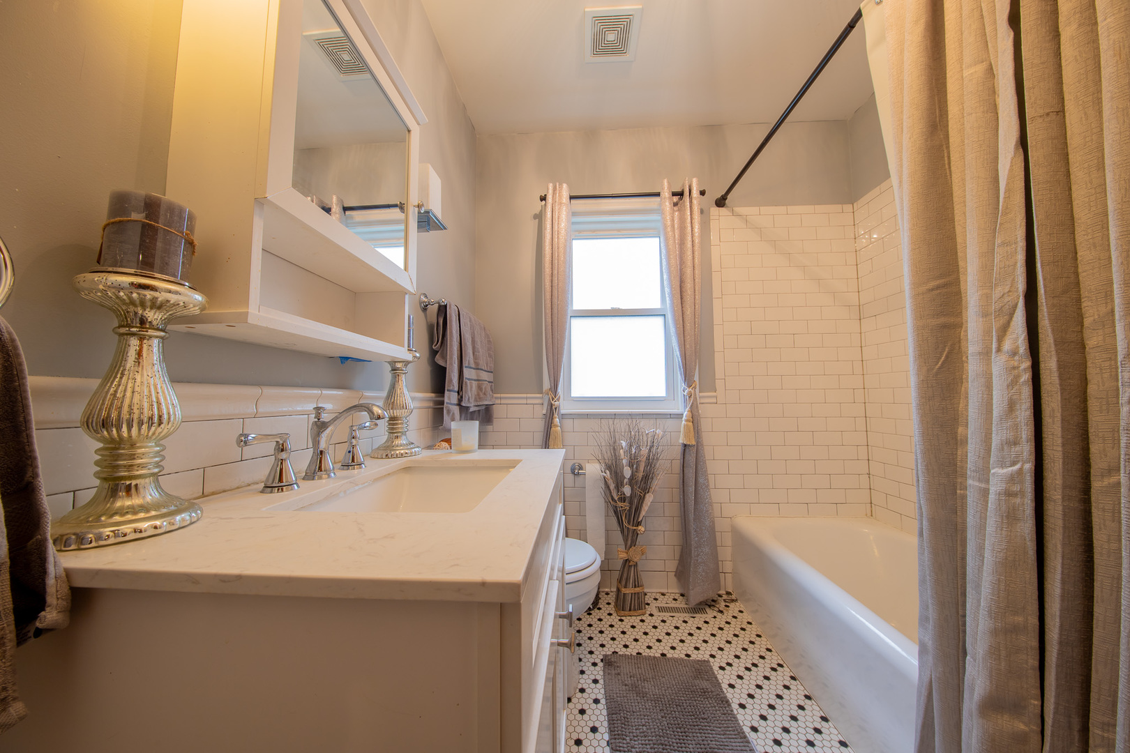 10215 South Charles Street Chicago, IL 60643 - Photo 12 of 33 a bathroom with a sink and a mirror