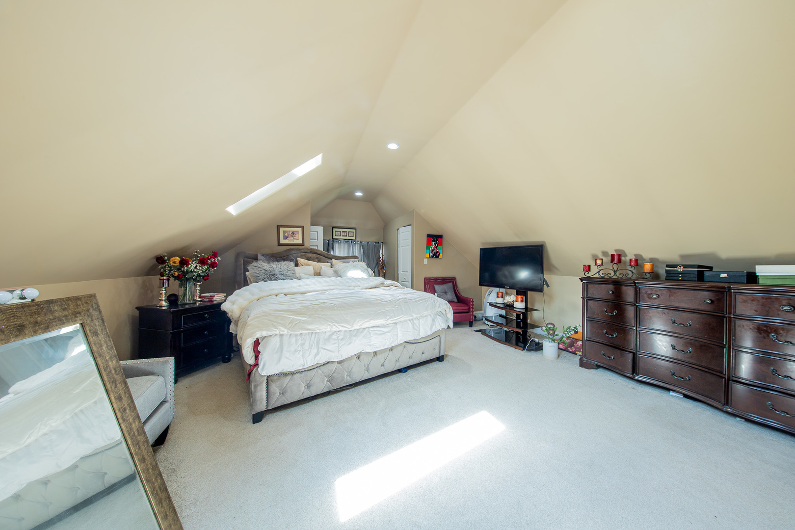 10215 South Charles Street Chicago, IL 60643 - Photo 16 of 33 a spacious bedroom with a bed and a dresser