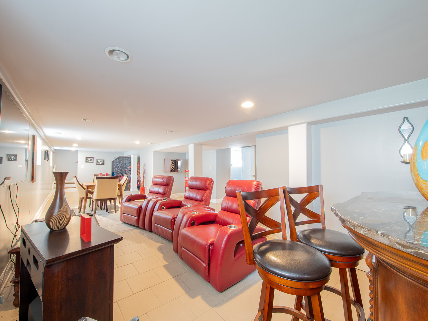 10215 South Charles Street Chicago, IL 60643 - Photo 23 of 33 a living room with furniture a flat screen tv and kitchen view