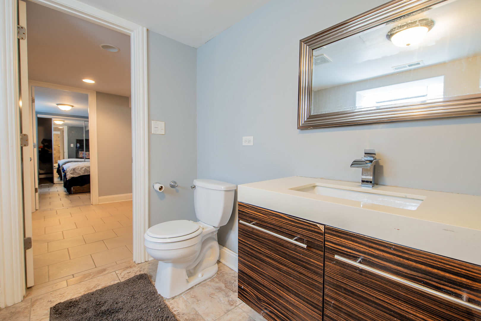 10215 South Charles Street Chicago, IL 60643 - Photo 26 of 33 a bathroom with a sink a toilet and shower