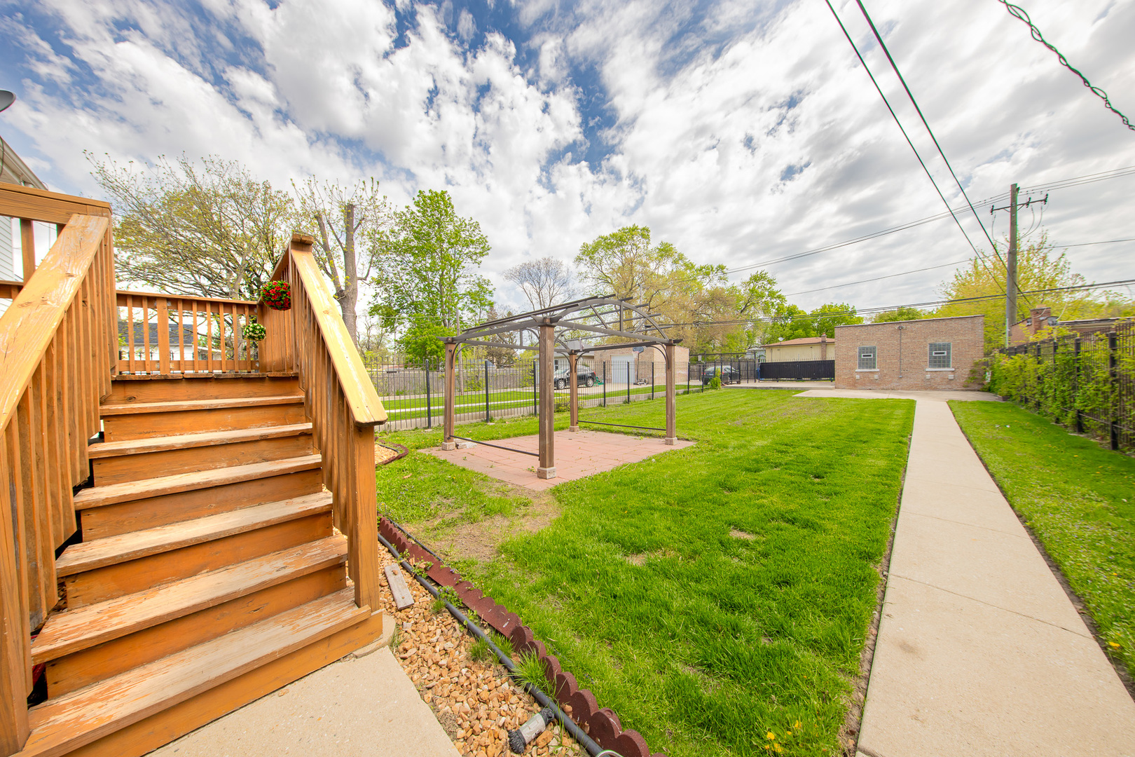 10215 South Charles Street Chicago, IL 60643 - Photo 29 of 33 a view of swimming pool with a garden and trees