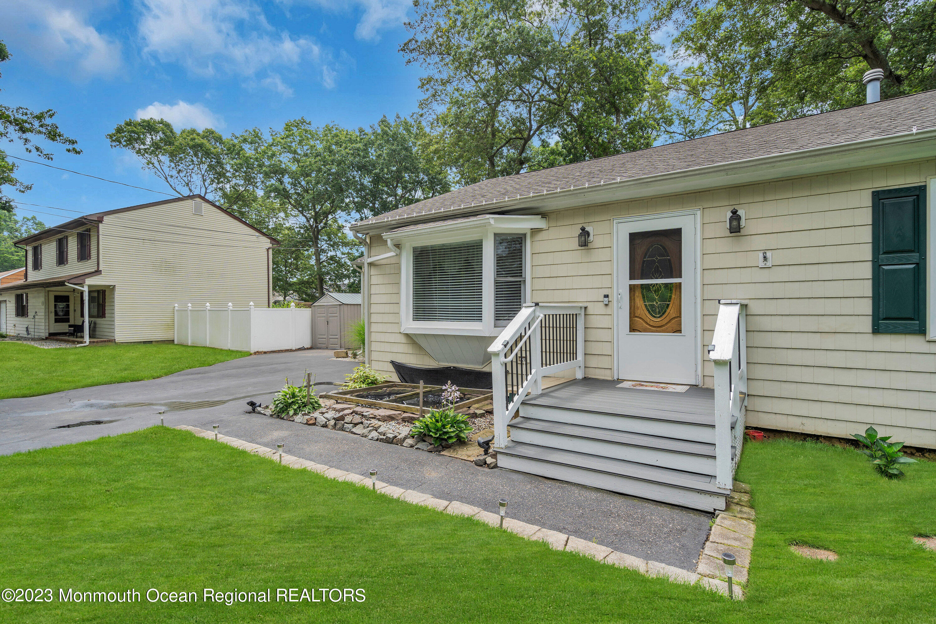 20 Woodland Road Bayville, NJ 08721 - Photo 15 of 62 a view of a house with a yard