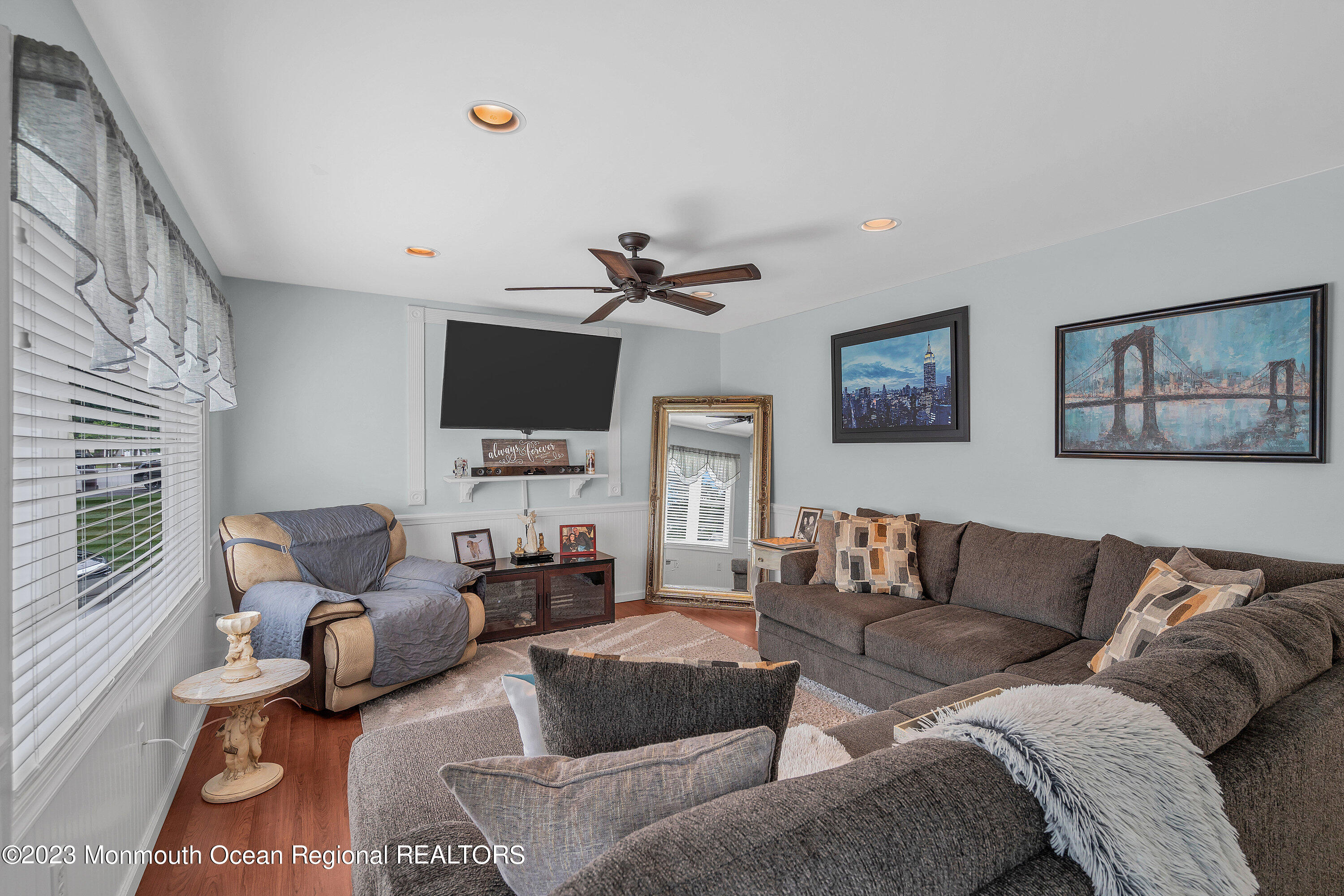 20 Woodland Road Bayville, NJ 08721 - Photo 18 of 62 a living room with furniture and a flat screen tv