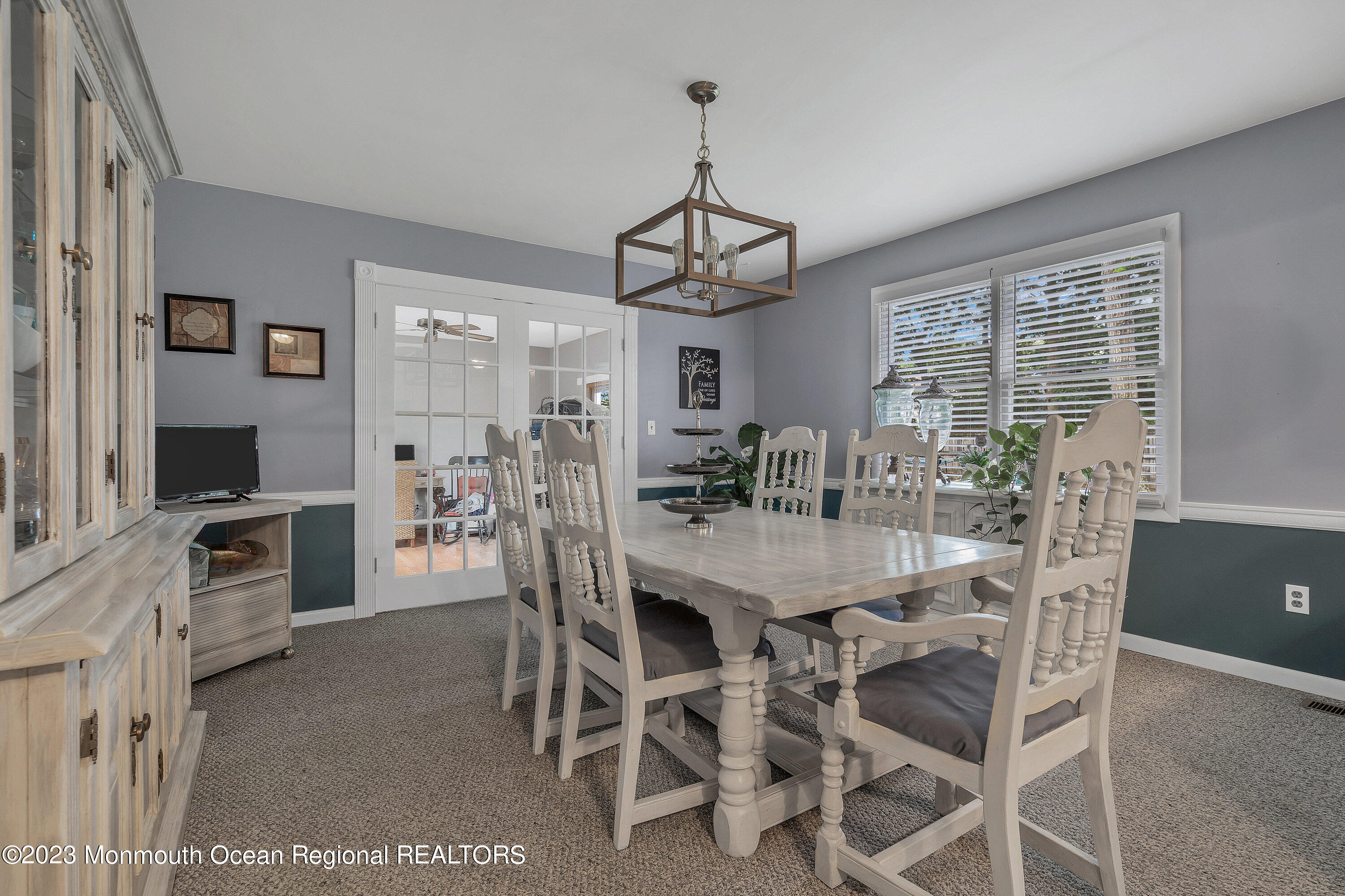 20 Woodland Road Bayville, NJ 08721 - Photo 21 of 62 a view of a dining room with furniture window and wooden floor