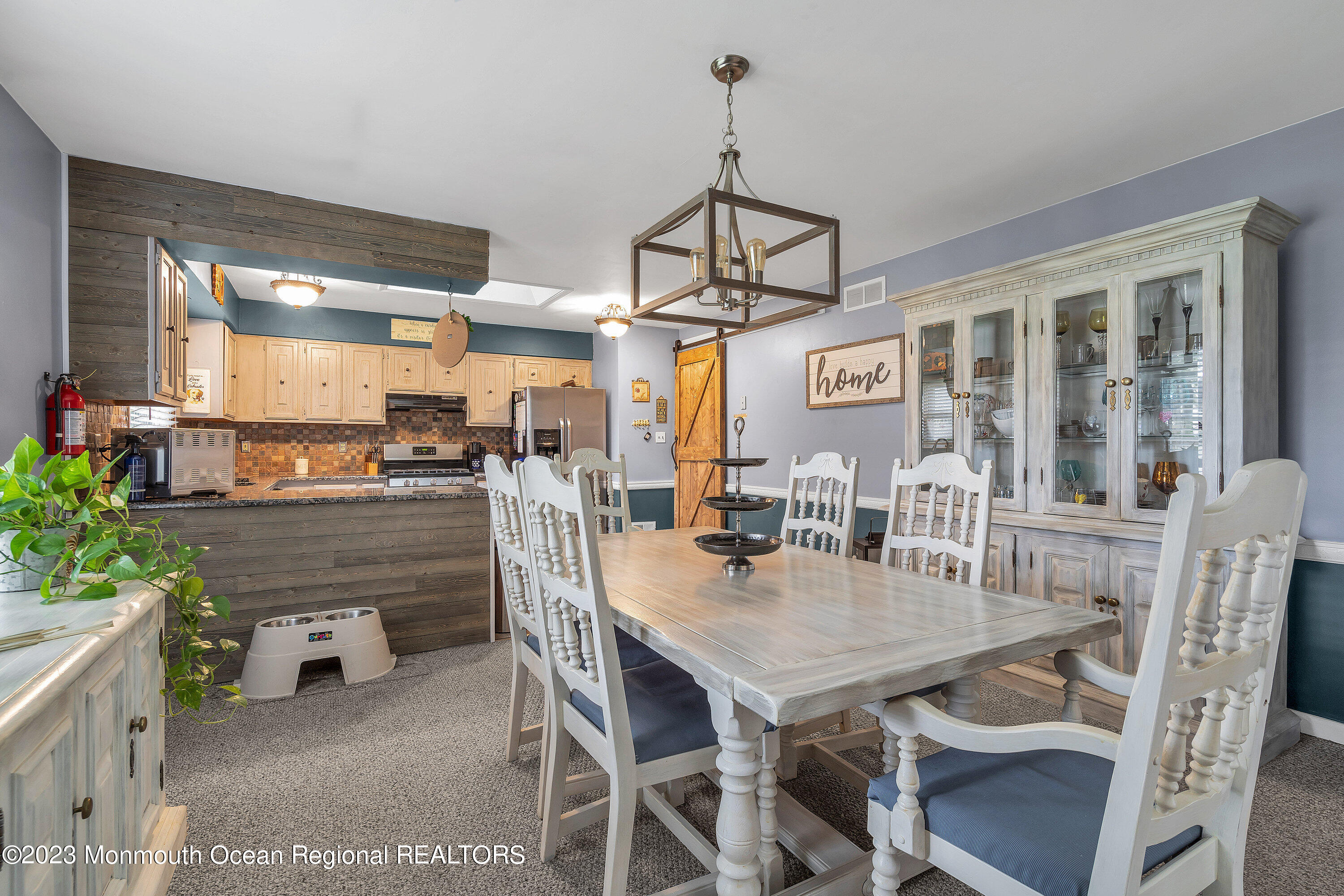 20 Woodland Road Bayville, NJ 08721 - Photo 24 of 62 a dining room with furniture a chandelier and window