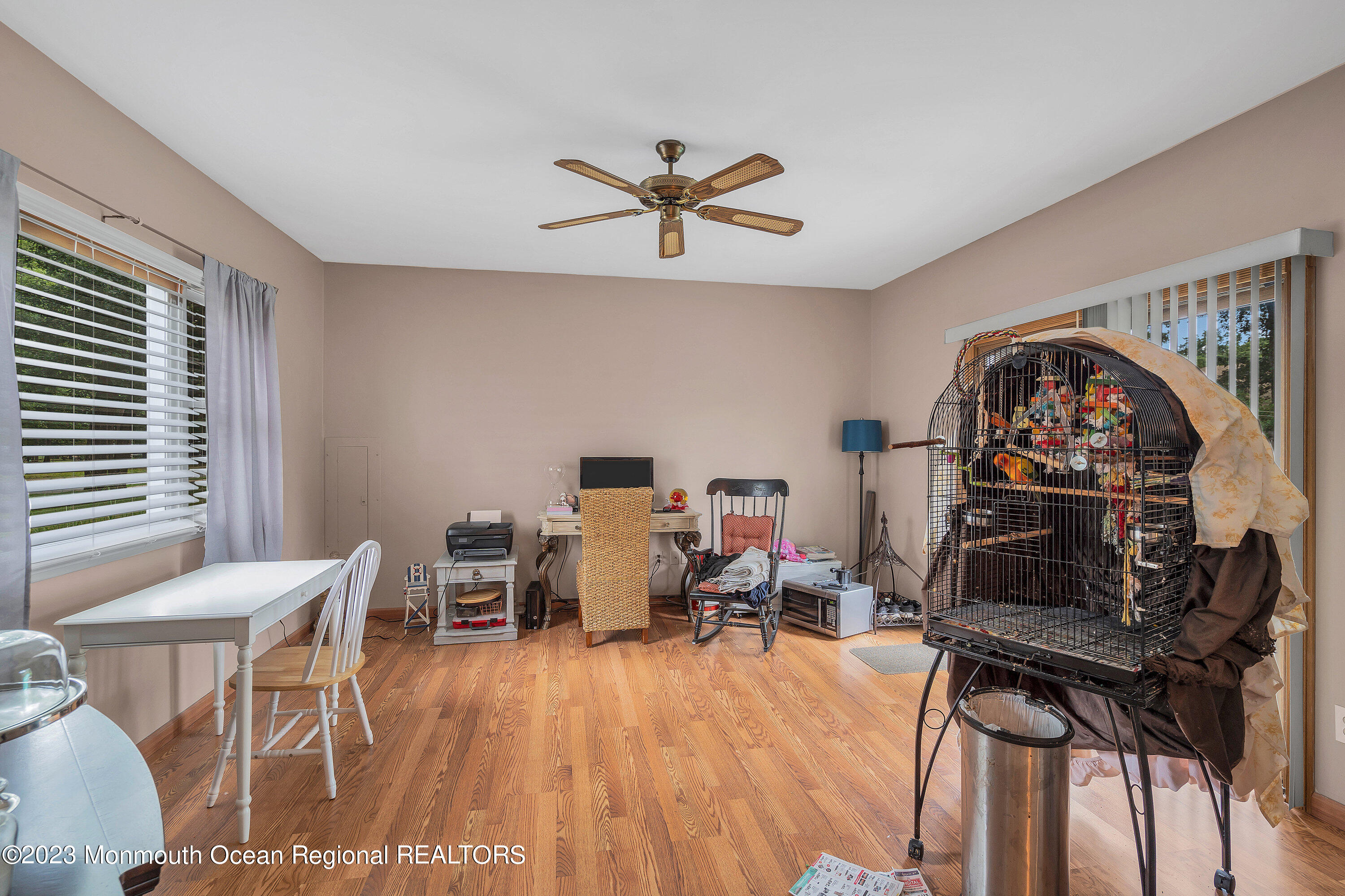 20 Woodland Road Bayville, NJ 08721 - Photo 25 of 62 a living room with furniture a rug and a window