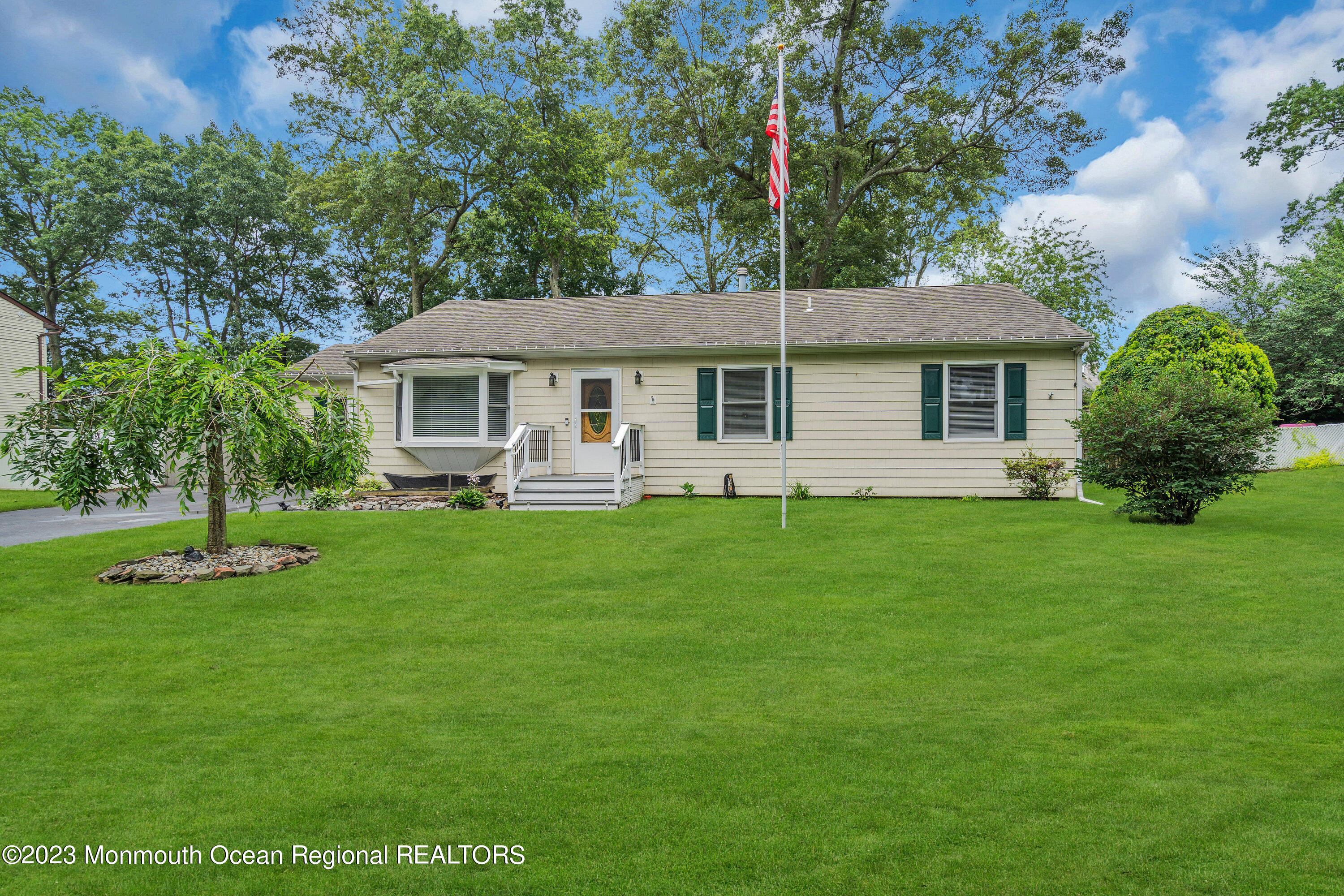20 Woodland Road Bayville, NJ 08721 - Photo 3 of 62 a front view of house with yard and green space