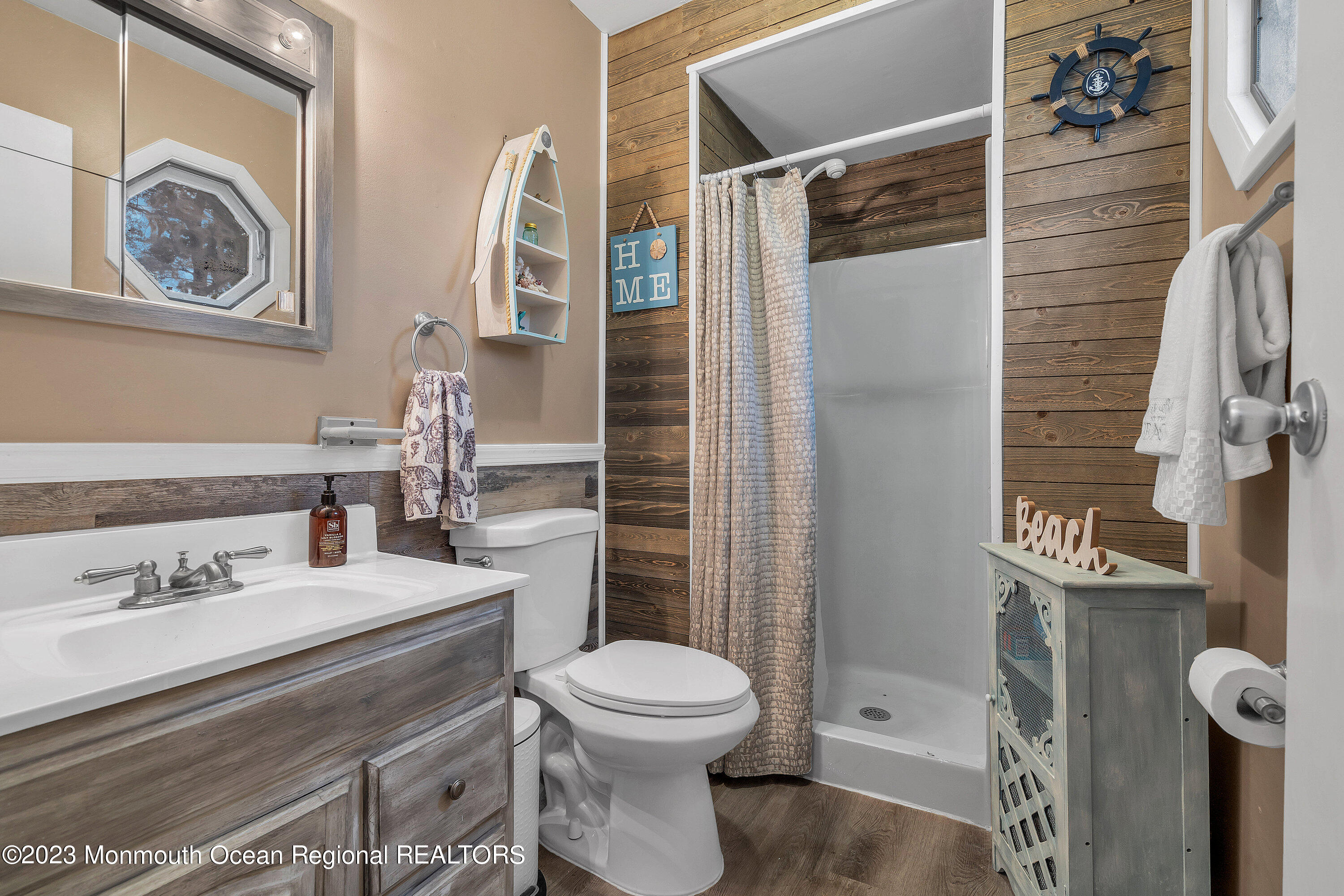 20 Woodland Road Bayville, NJ 08721 - Photo 48 of 62 a bathroom with a sink toilet and shower