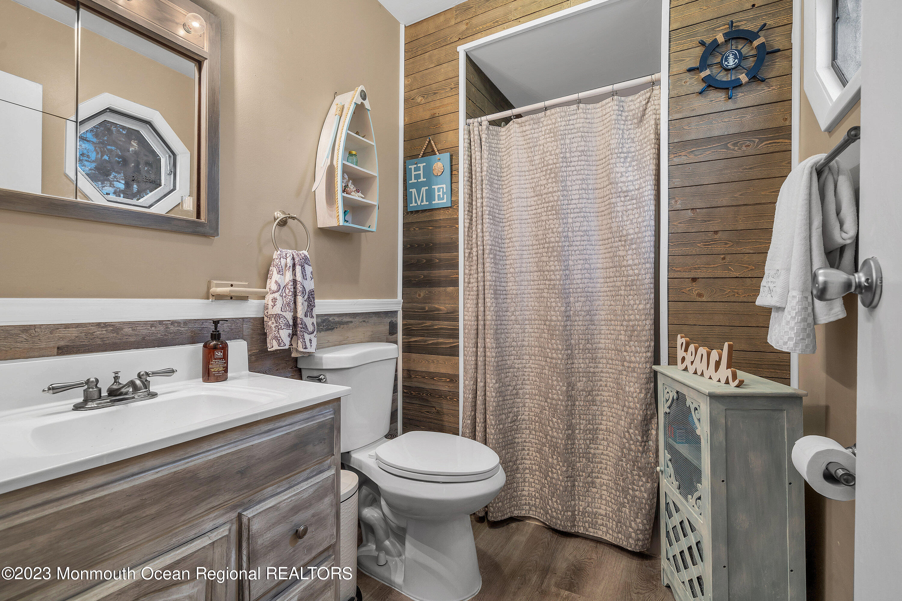 20 Woodland Road Bayville, NJ 08721 - Photo 49 of 62 a bathroom with a sink toilet and shower